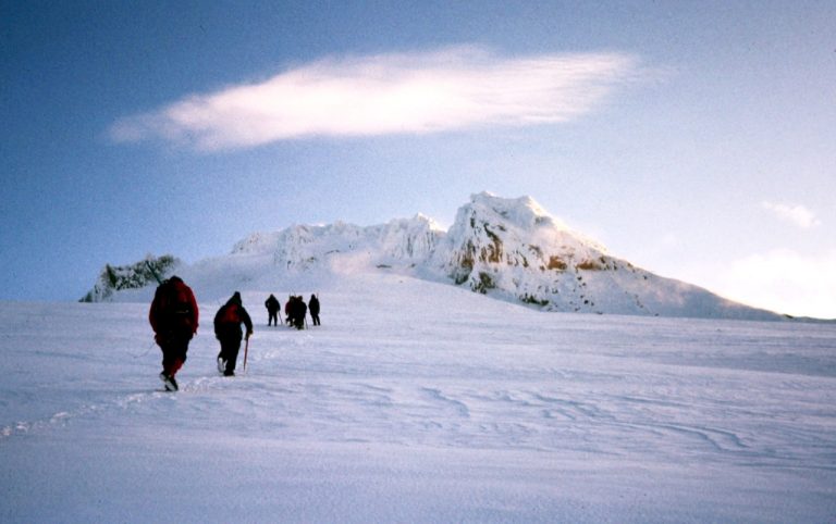 Mountain climbers ascend the Palmer Glacier en route to the snowy summit of Mt Hood in the Oregon Cascades