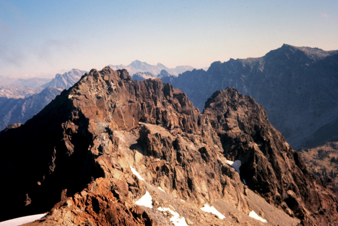 Looking across a gap at the red rock of North and East Ingalls Peaks