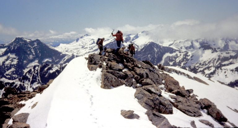 Climbers stand atop Fortress Mountain in the Glacier Peak Wilderness