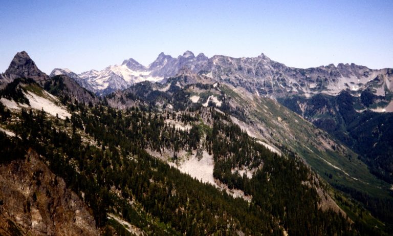 The Snoqualmie Mountains stand on the horizon viewed from Kendall Peak