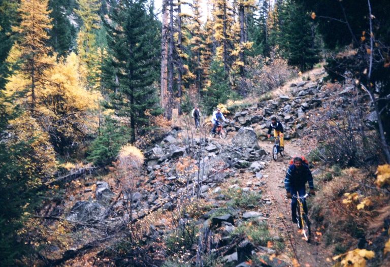 A group of mountain bikers rides down Devils Gulch Trail in the Lower Wenatchee Mountains