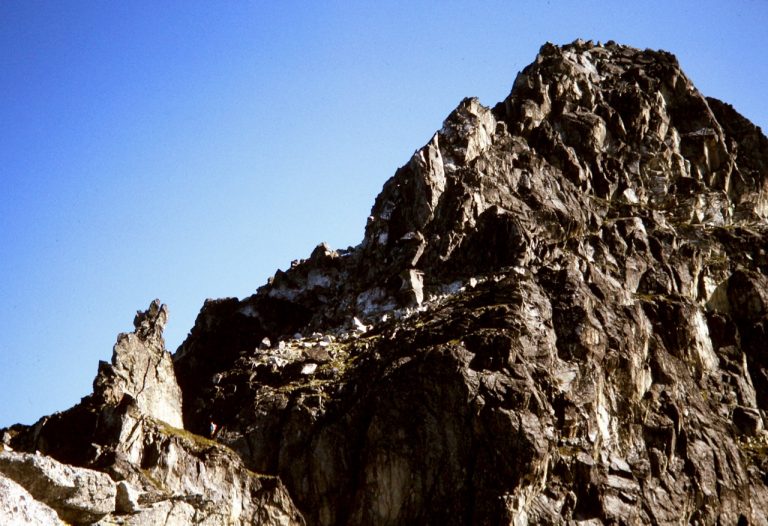 Looking up at the rocky summit of Sloan Peak in the Cascade Range