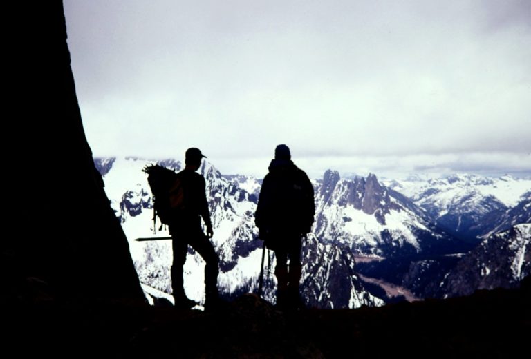 Two climbers stand at Burgundy Col on Silver Star Mountain in the North Cascades