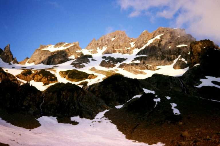 Evening sun highlights Monte Cristo Peak above Glacier Basin
