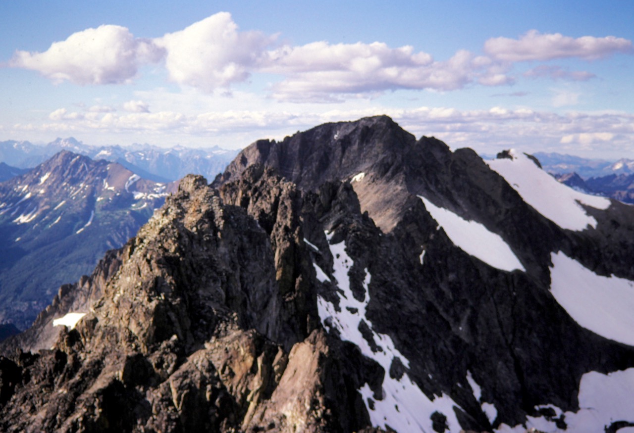 Mt Fernow with snow patches seen from the summit of Seven-Fingered Jack in the Entiat Mountains