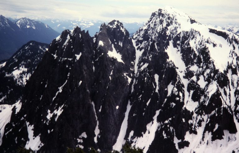 The three peaks of Mt Index rise above a deep valley