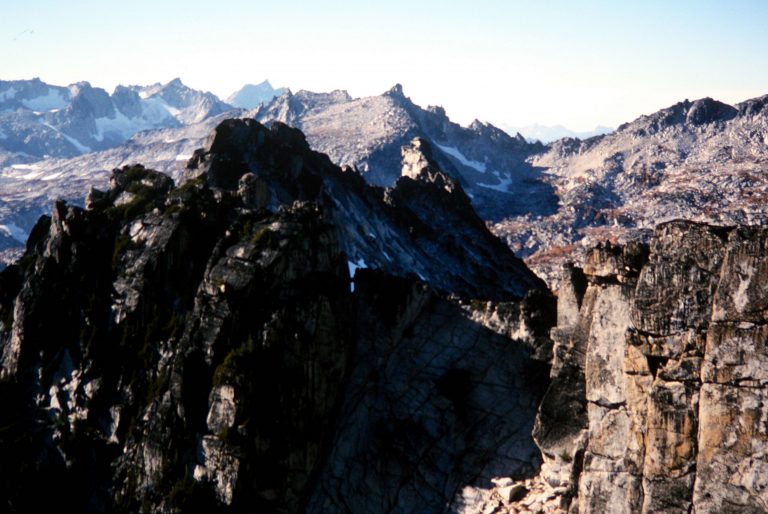 Looking over the top of a rock pinnacle from The Temple in The Enchantments