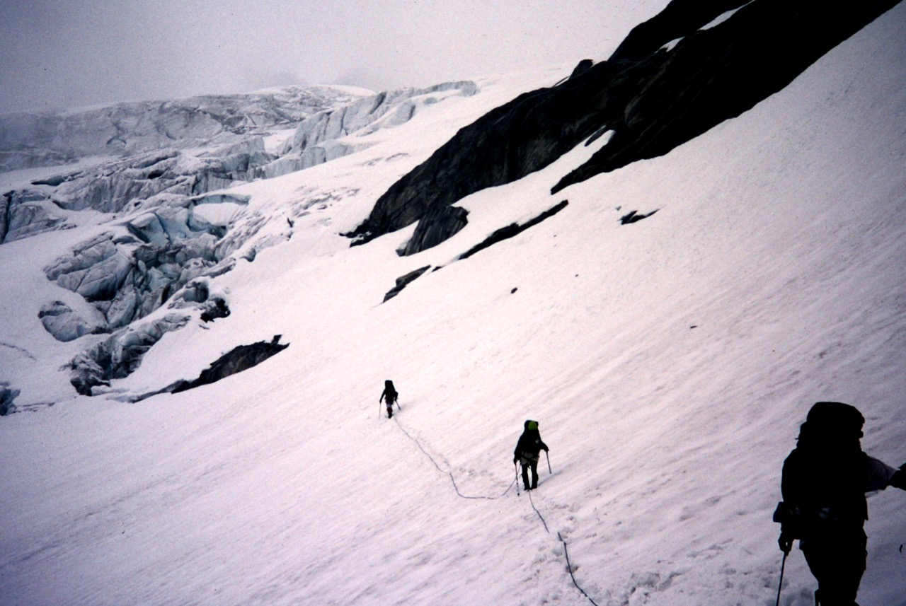 roped mountain climbers traversing the Klawatti Glacier on the Inspiration Traverse in the North Cascades