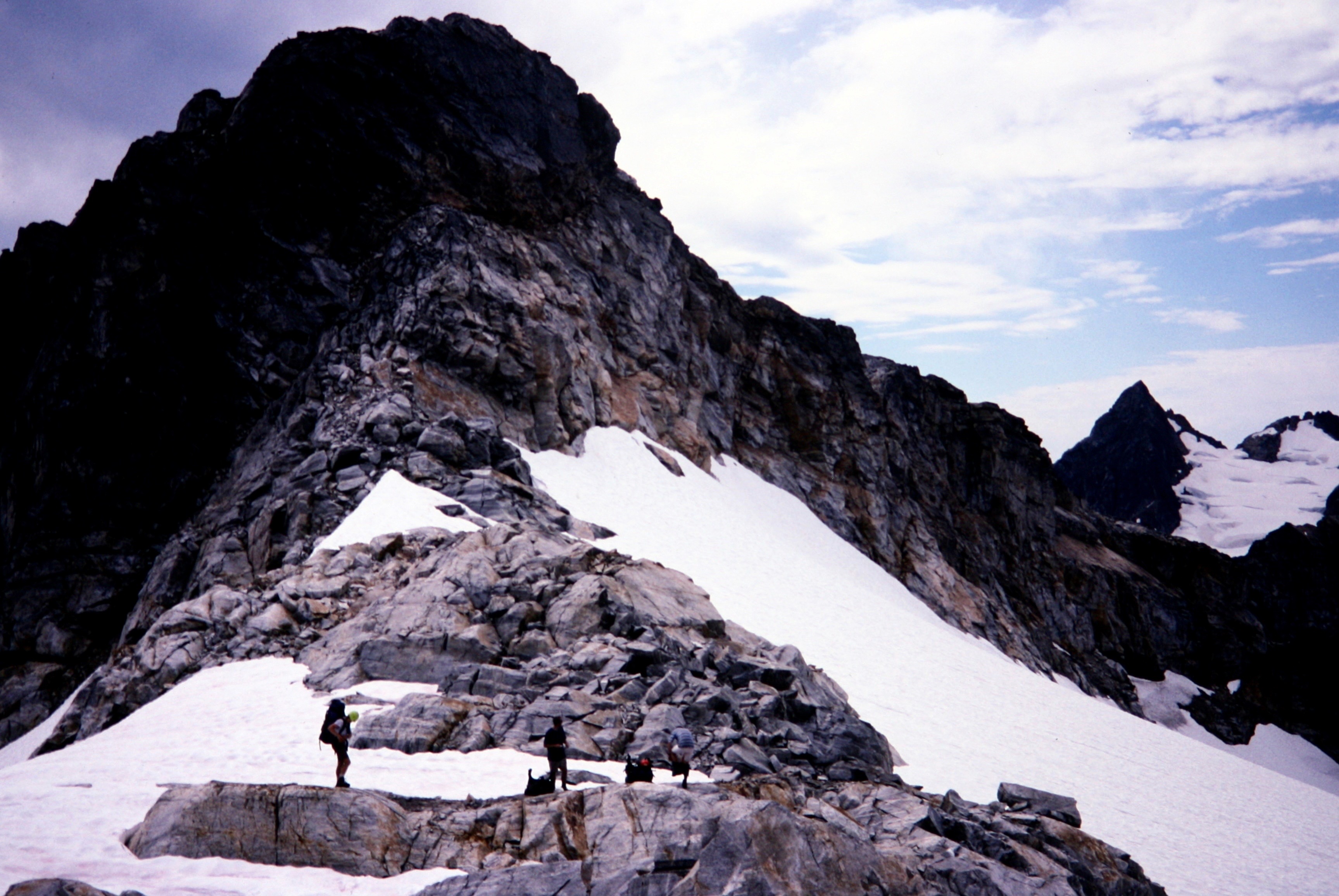 mountain climber camp at Luna Pass in the rocks and snow patches in the Northern Picket Range