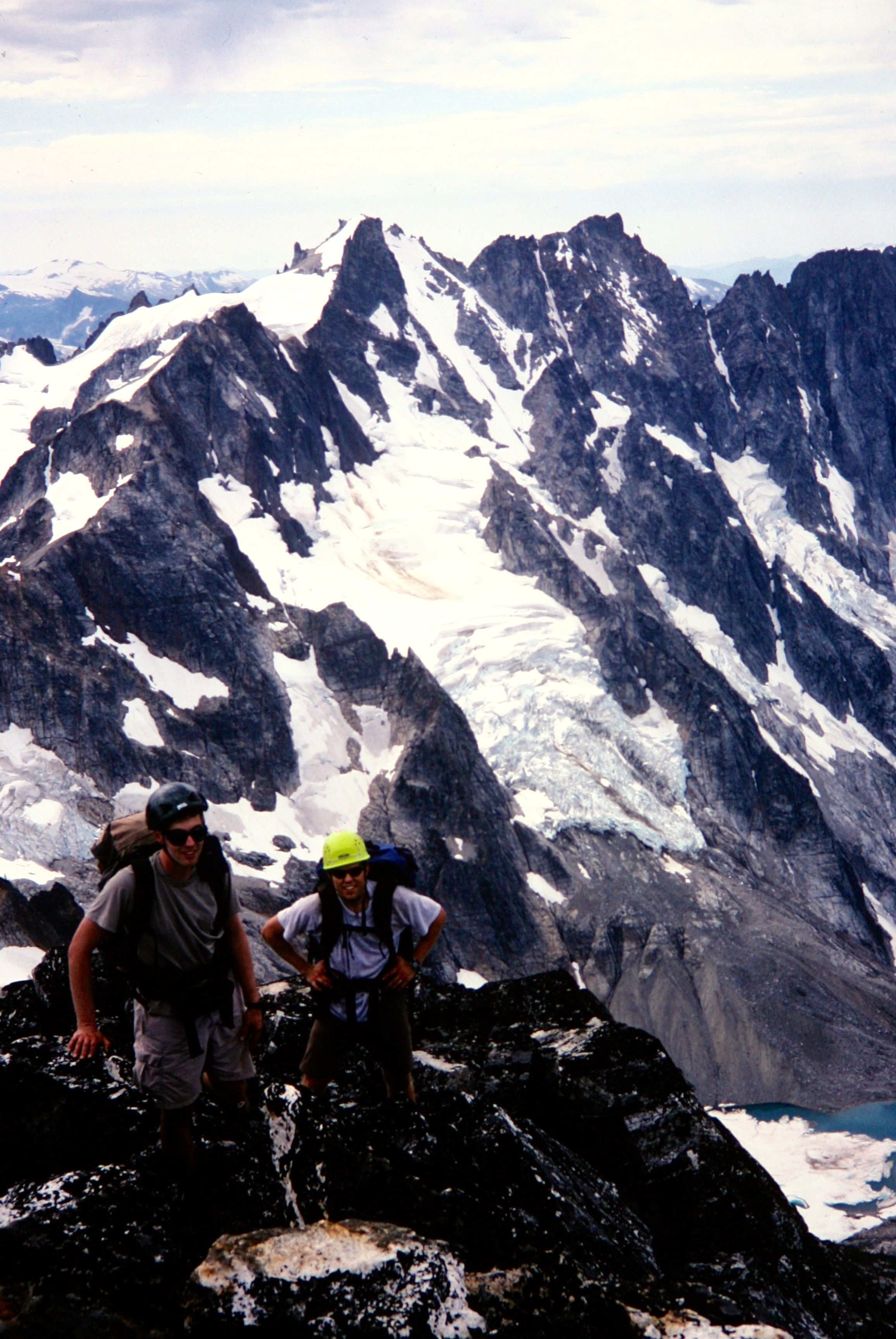 mountain climbers srambling up Luna Peak ridge line with Mt Fury in the background