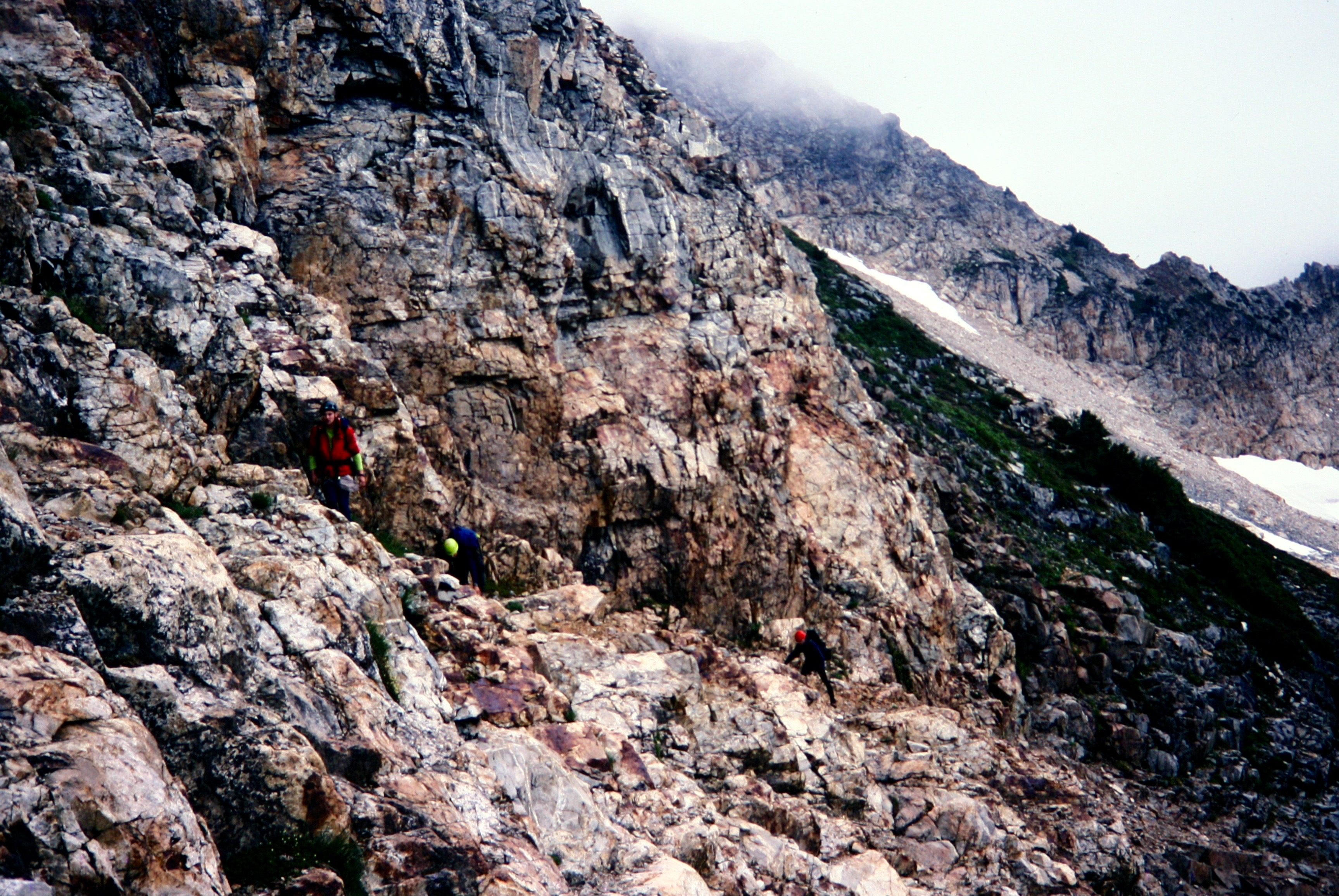 mountain climbers scrambling rocky ridge on Mt Fury in the Northern Picket Range