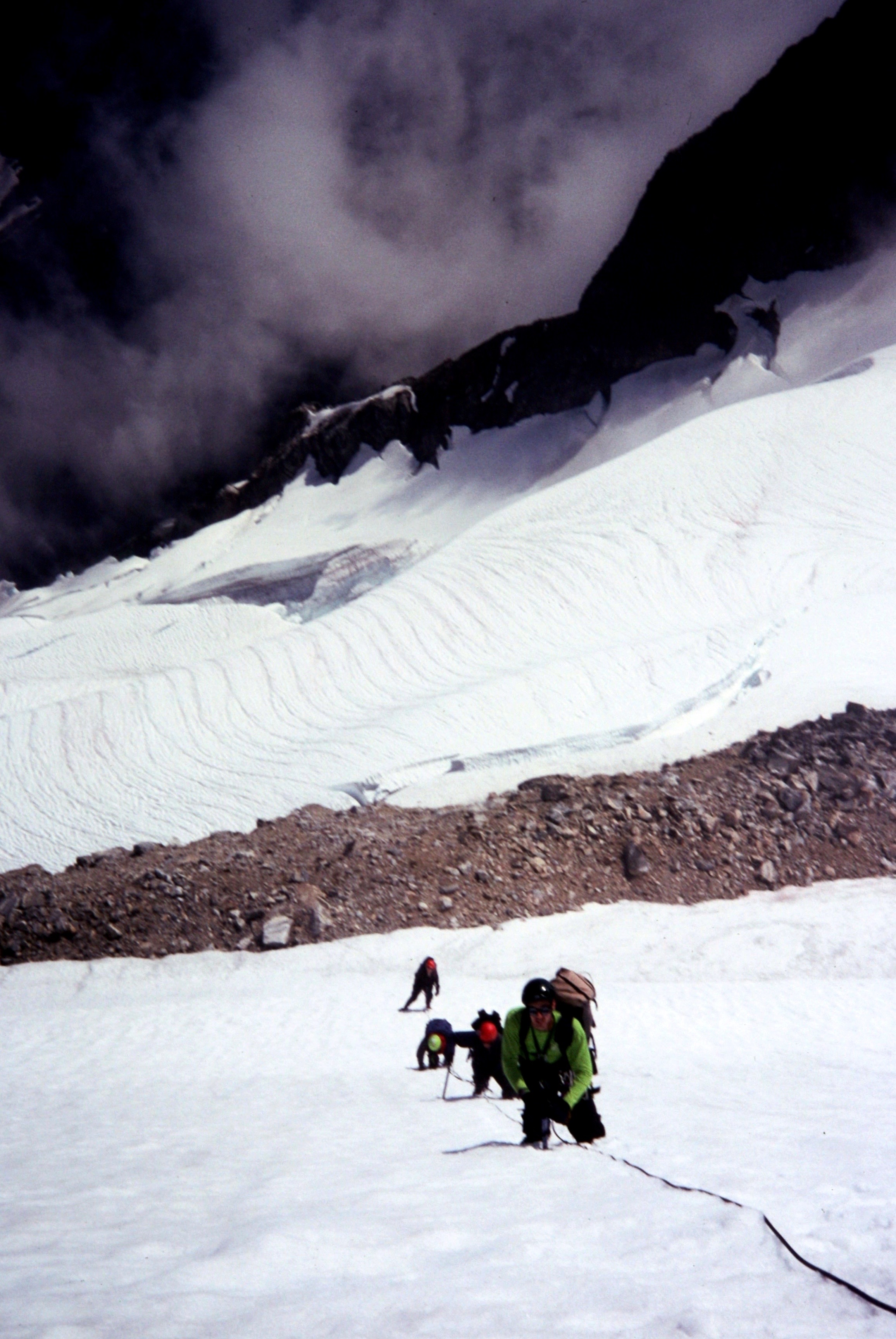 looking down on roped mountain climbers assending the East Fury Glacier in the Northern Picket Range