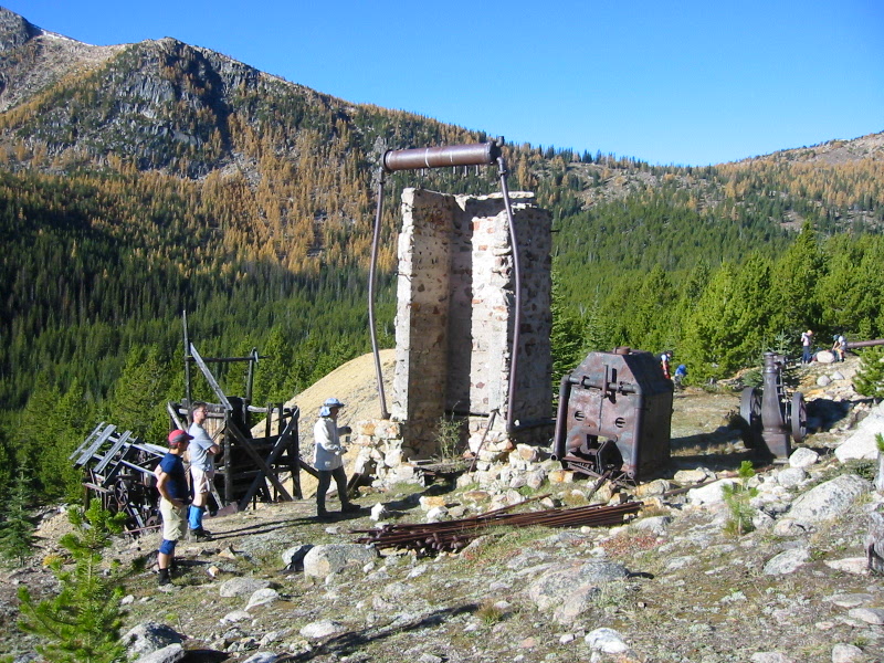 mountain climbers investigating Tungsten Mine ruins in the Similkameen Mountains in the Pasayten Wilderness