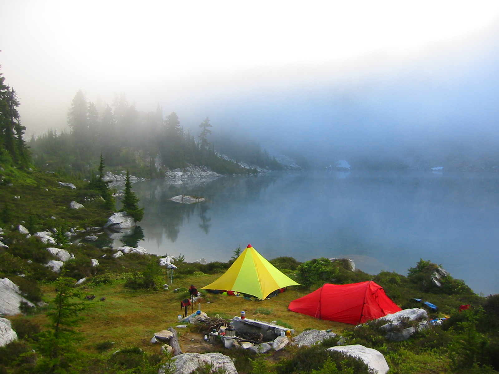 climbers camp at Bench Lake in the Glacier Peak Wilderness with evening fog
