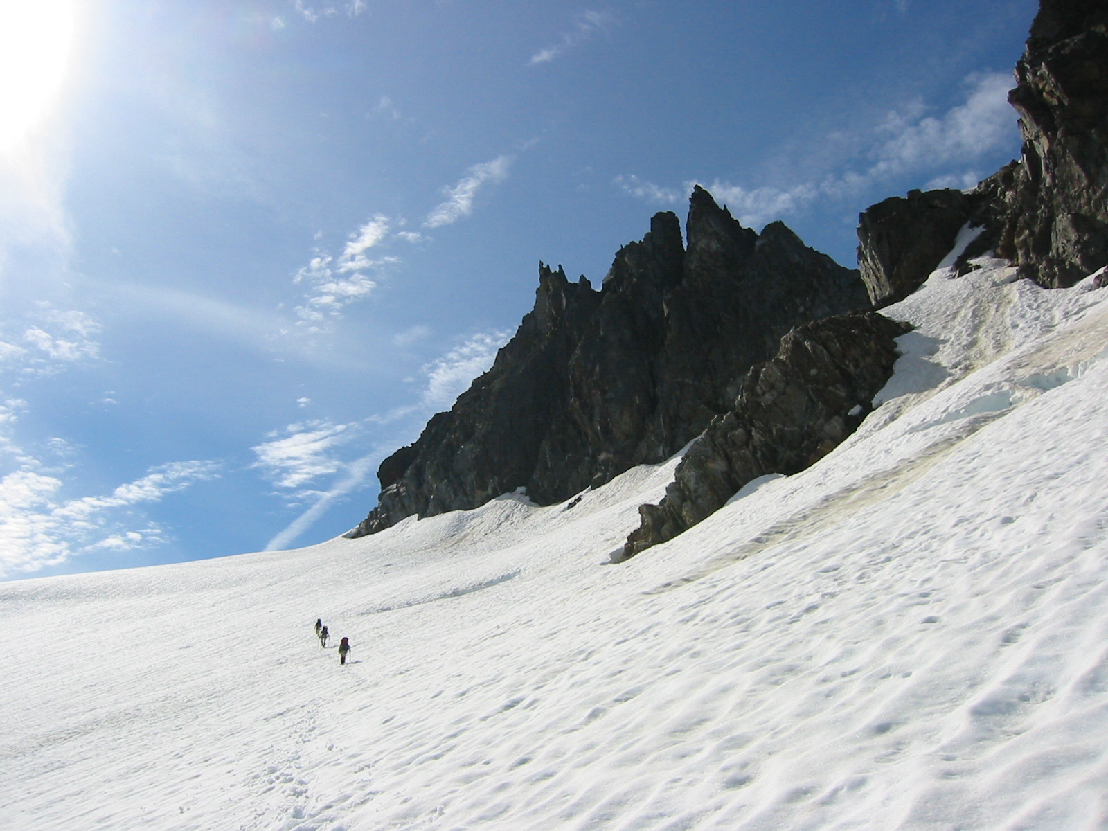 mountain climbers traversing the Hoch Joch Glacier in the Glacier Peak Wilderness