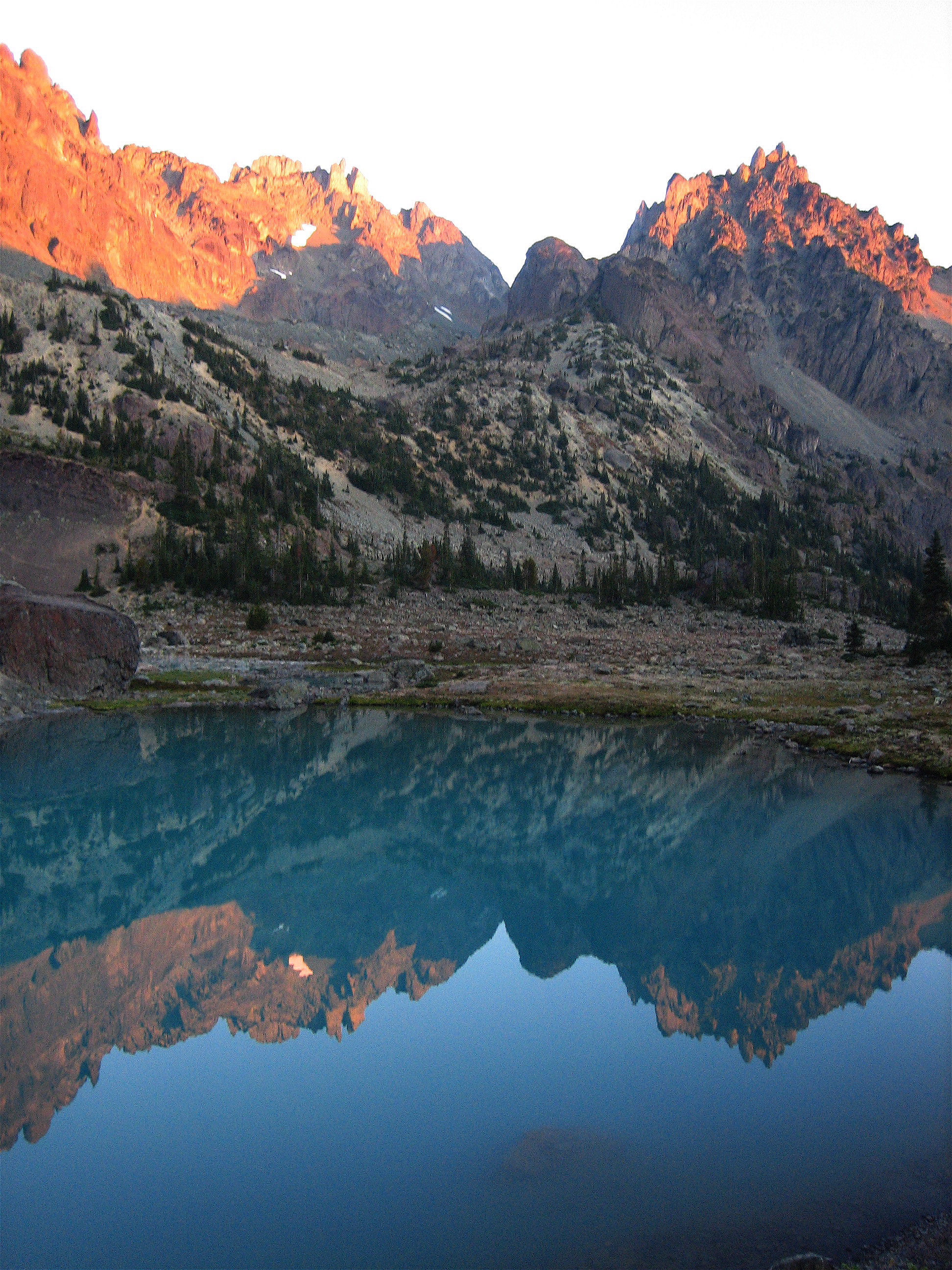 The Sundial at sunset reflecting in the Royal Tarn in the Olympic Mountain National Park
