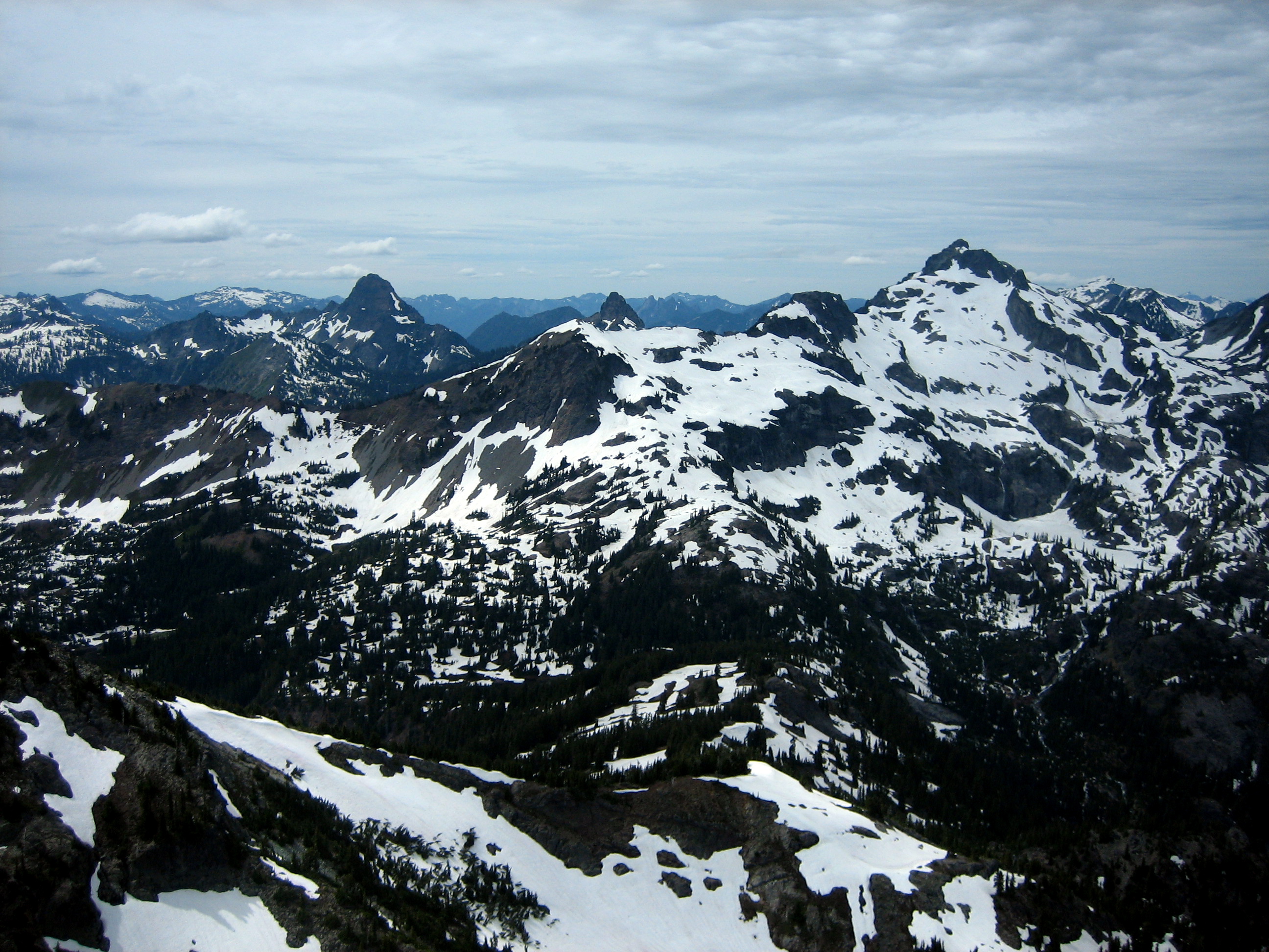 Distant mountain view of Mt Thomson and Chikamin Peak in the Snoqualmie Mountains