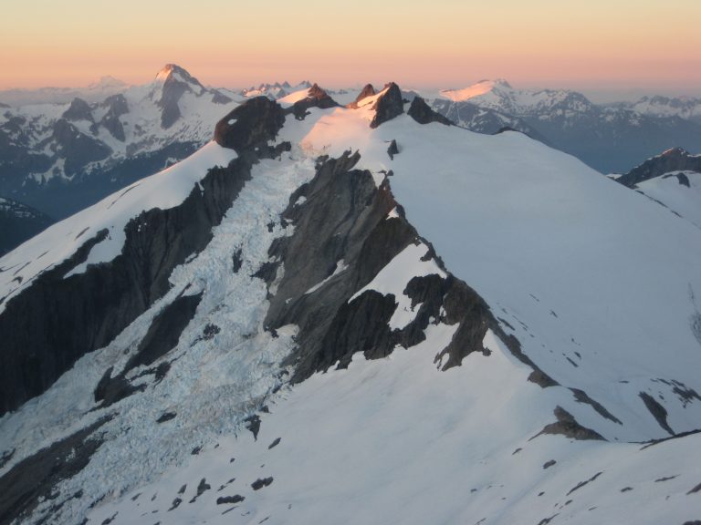 Morning sun lights up Icy Peaks and Mt Blum from Ruth Mountain
