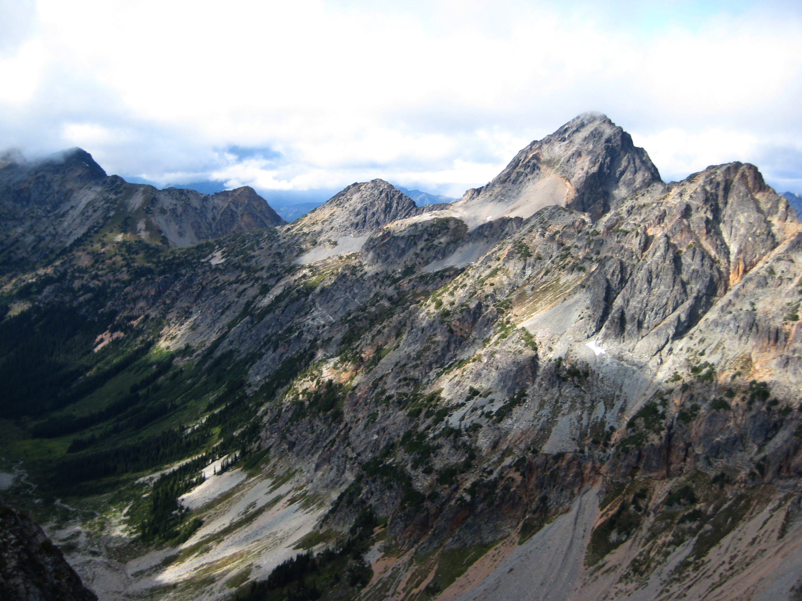 Easy Pass and Graybeard Peak in the Ragged Ridge mountain range as seen from the summit of Fisher Peak in North Cascades National Park