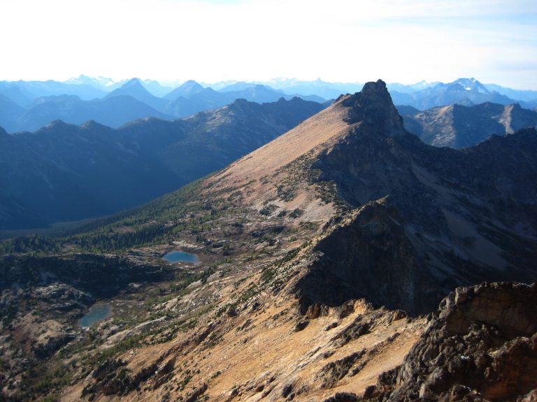 sharp, pointy summit of Golden Horn stands above Snowy Lakes in the Upper Methow Mountains