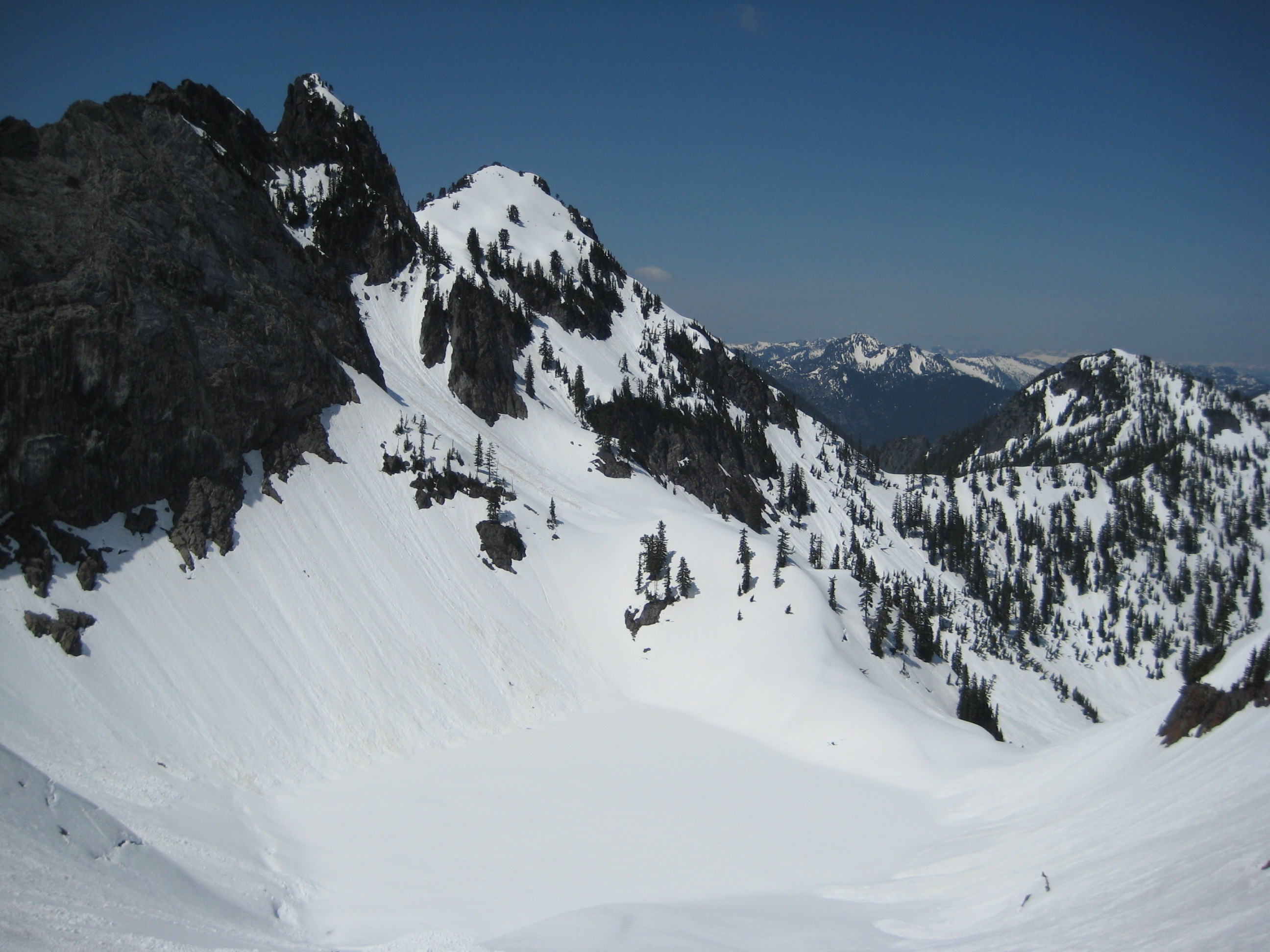 Mt Roosevelt and Chair Peak Lake full of snow on the Chair Peak Circumnavigation Ski Tour