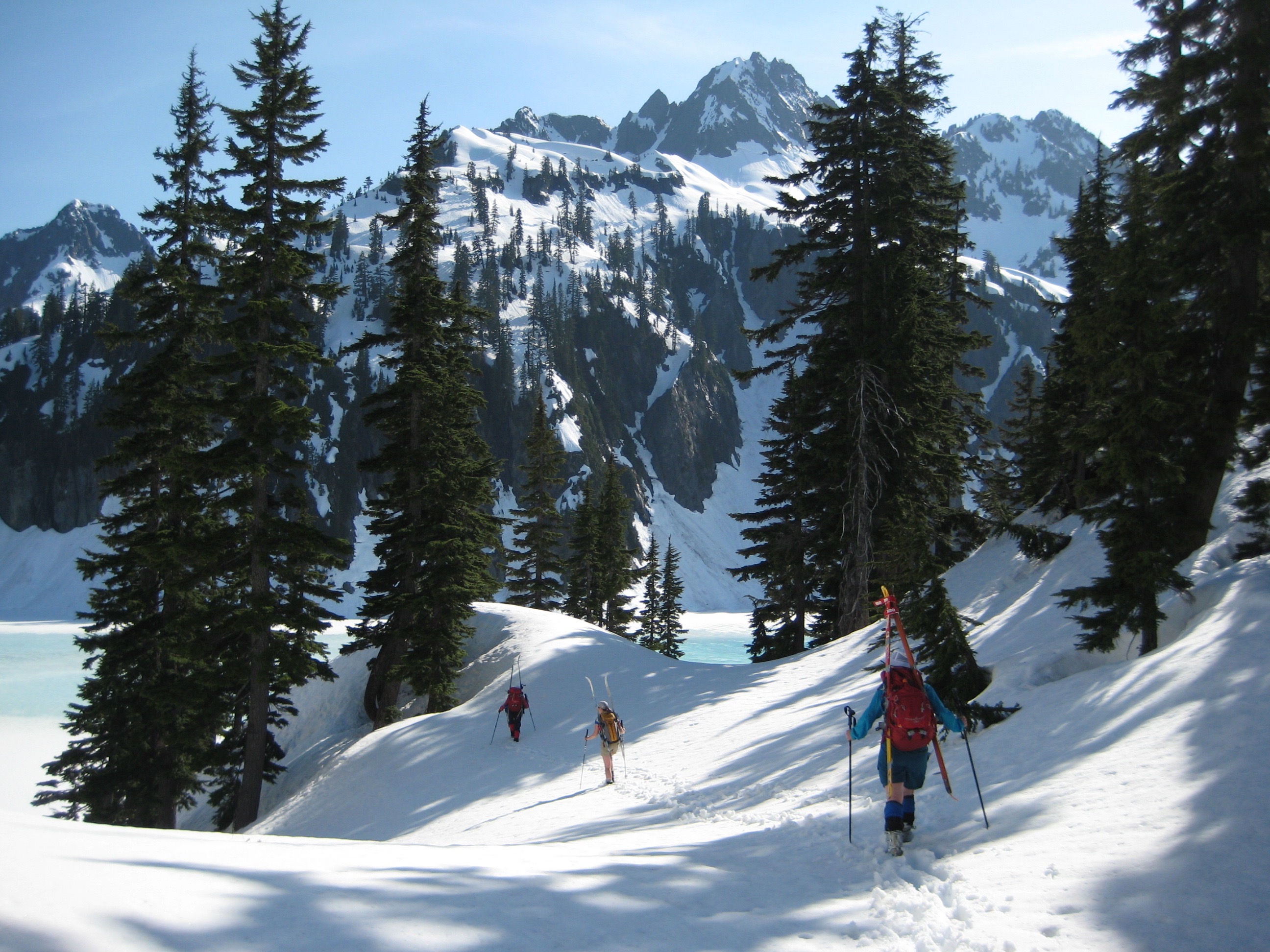 rolling snowy terrain above Snow Lake in the Snoqualmie Mountains