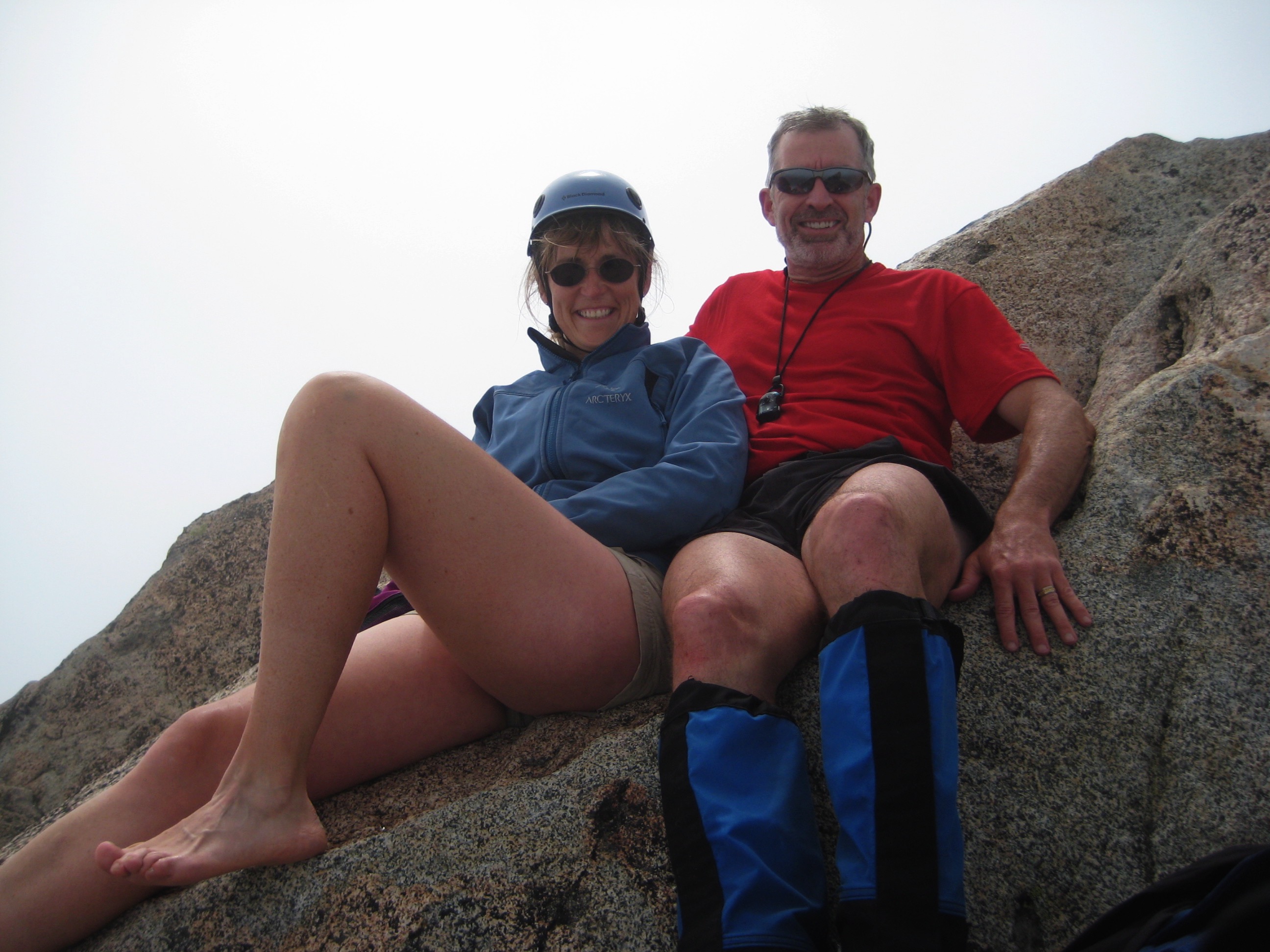 mountain climbers lounging on the summit slabs of Mt Stuart in the Icicle Mountains 