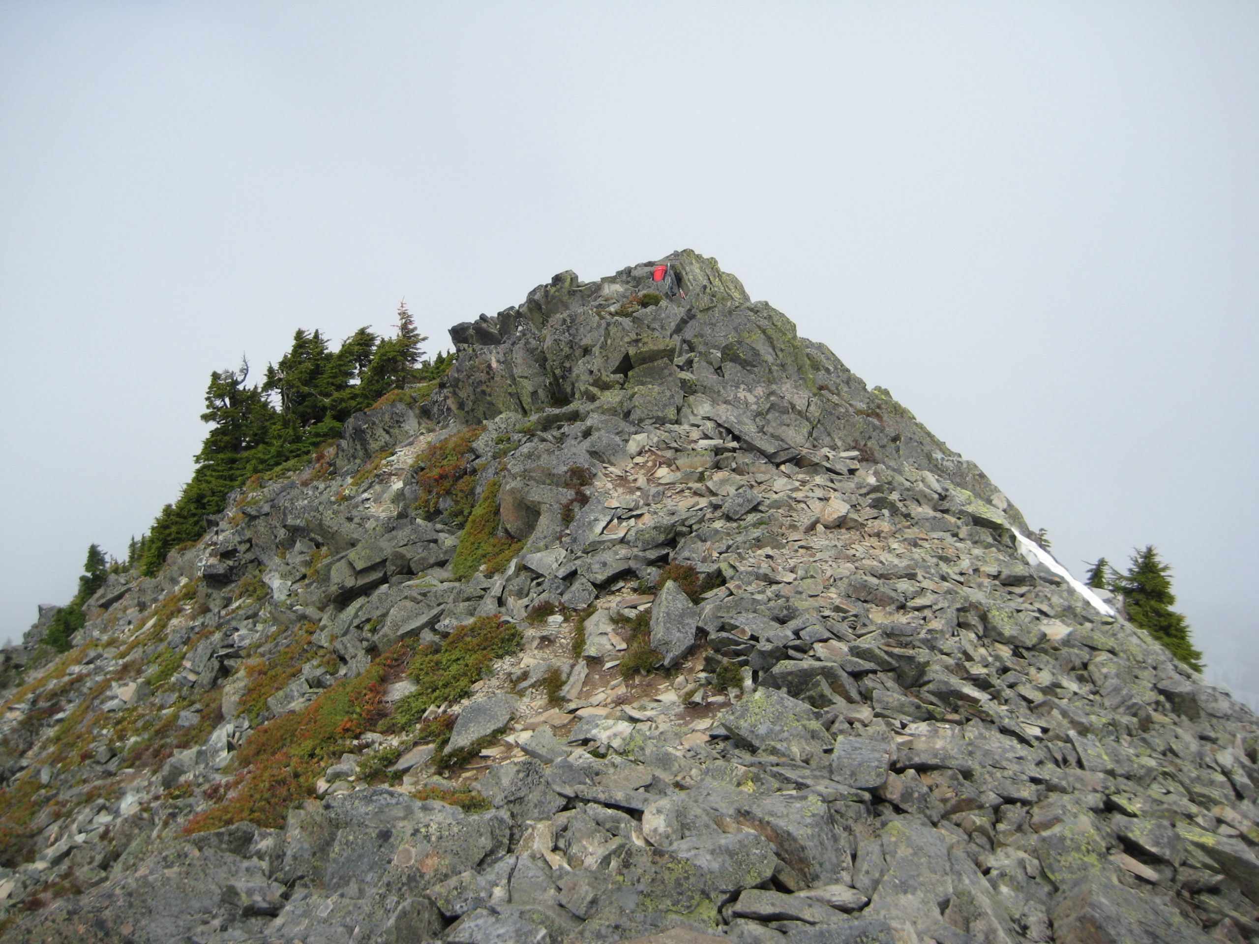 The summit of Silver Peak forms a rocky pyramid near Snoqualmie Pass