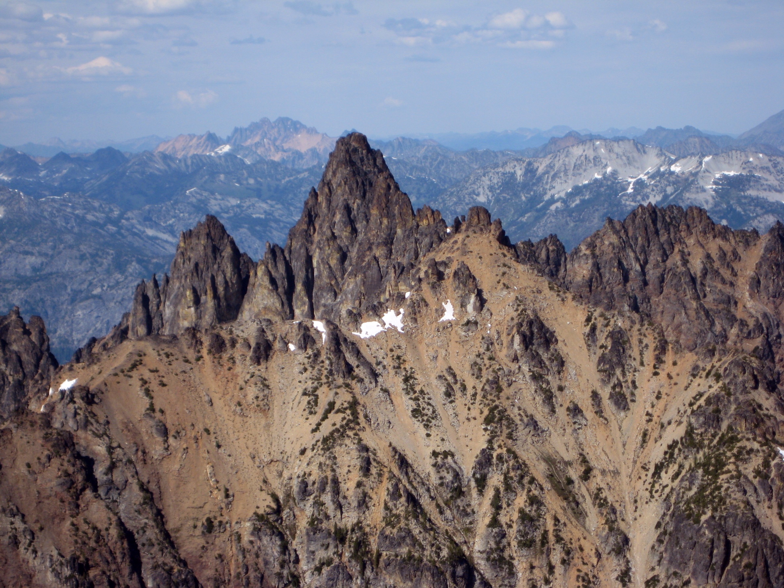 craggy horn on the summit of Tupshin Peak as seen from the summit of Devore Peak in the Glacier Peak Wilderness