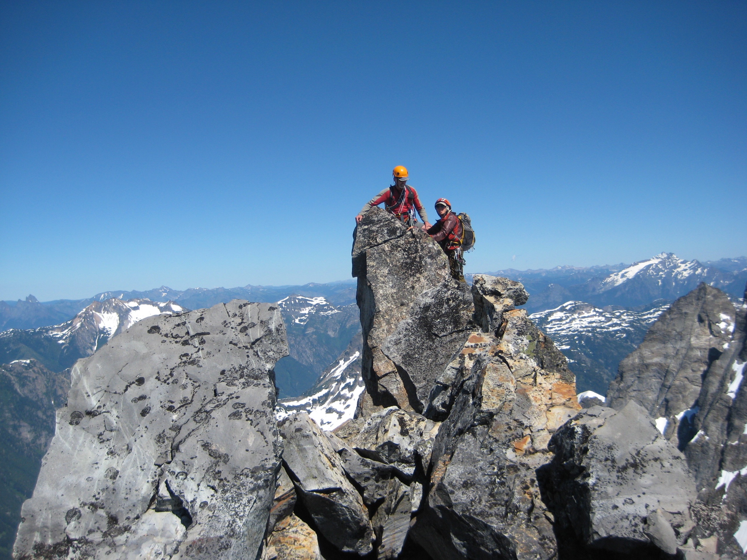 Mountain climbers on the rocky summit horn of Mt Terror in the Southern Pickets