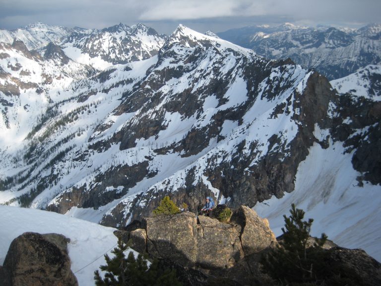 Looking out over a range of snowy peaks from South Early Winters Spire