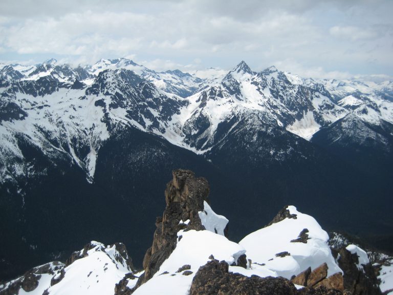 Looking over a vast sea of rugged mountains that make up Ragged Ridge as seen from the summit of Mt Hardy in the Upper Methow Mountains