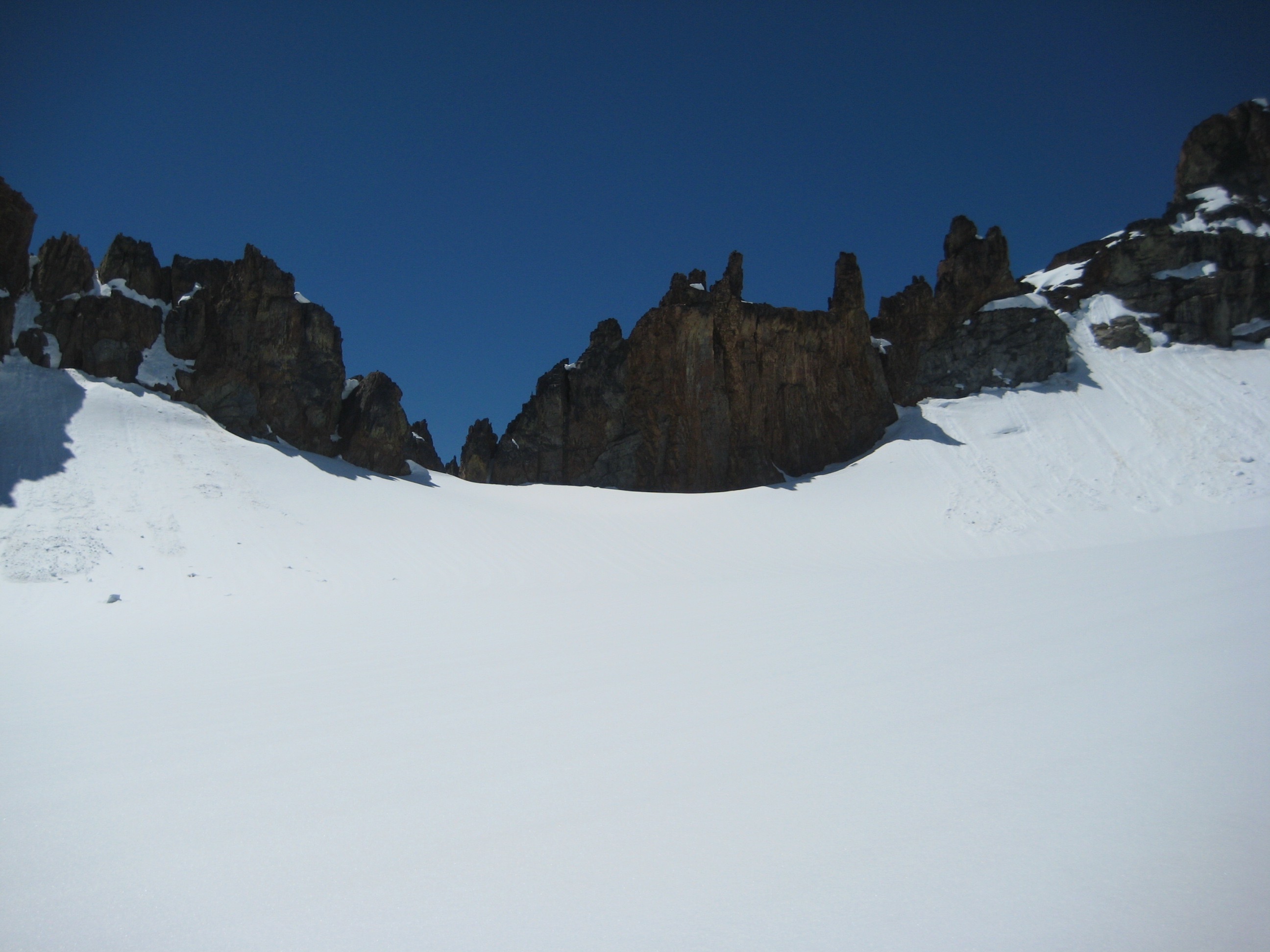 looking up glacier at Katsuk-Kimtah Notch and Grotesque Gendarmes on the Ragged Ridge in the North Cascades