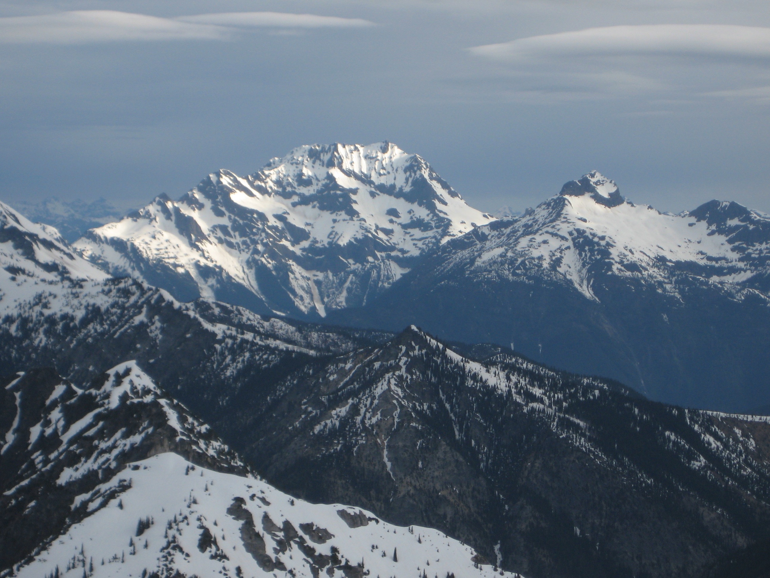 evening light on snow covered Jack Mountain and Crater Mountain in the North Cascades