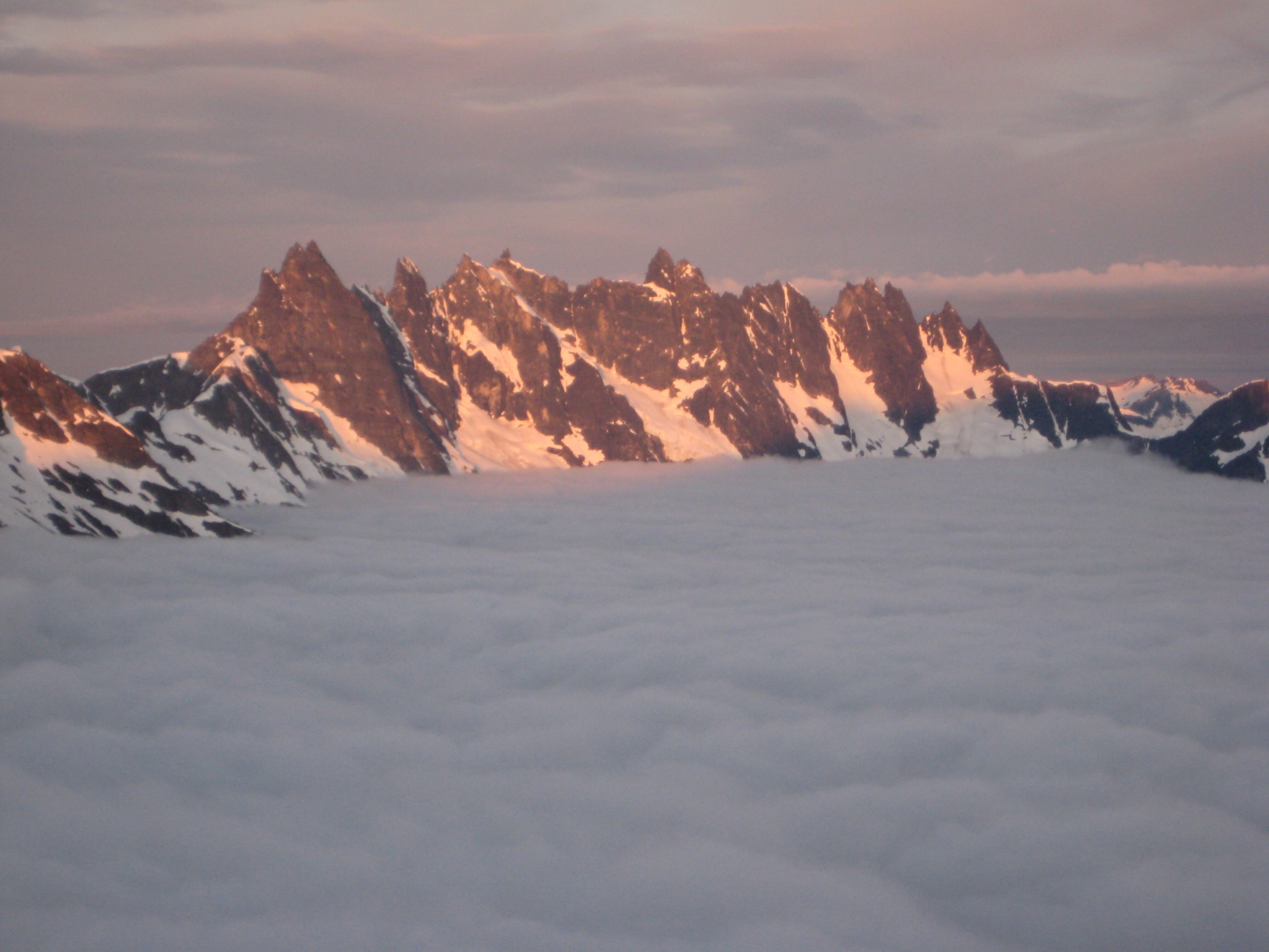 morning light on the Southern Picket Range in North Cascades National Parl as seen from the ridge of Mt Prophet