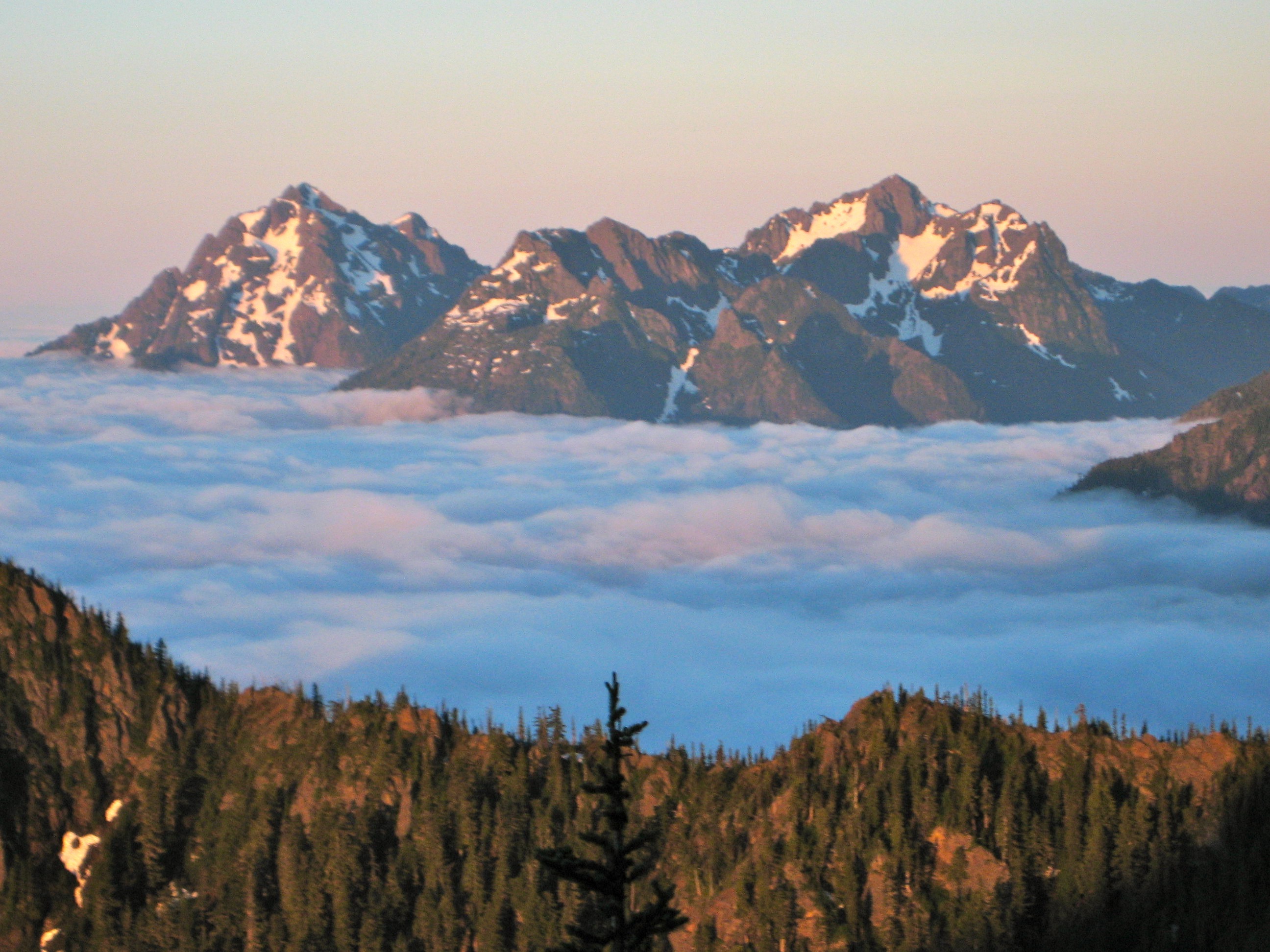 morning light on Mt Washington and Mt Pershing with low valley fog