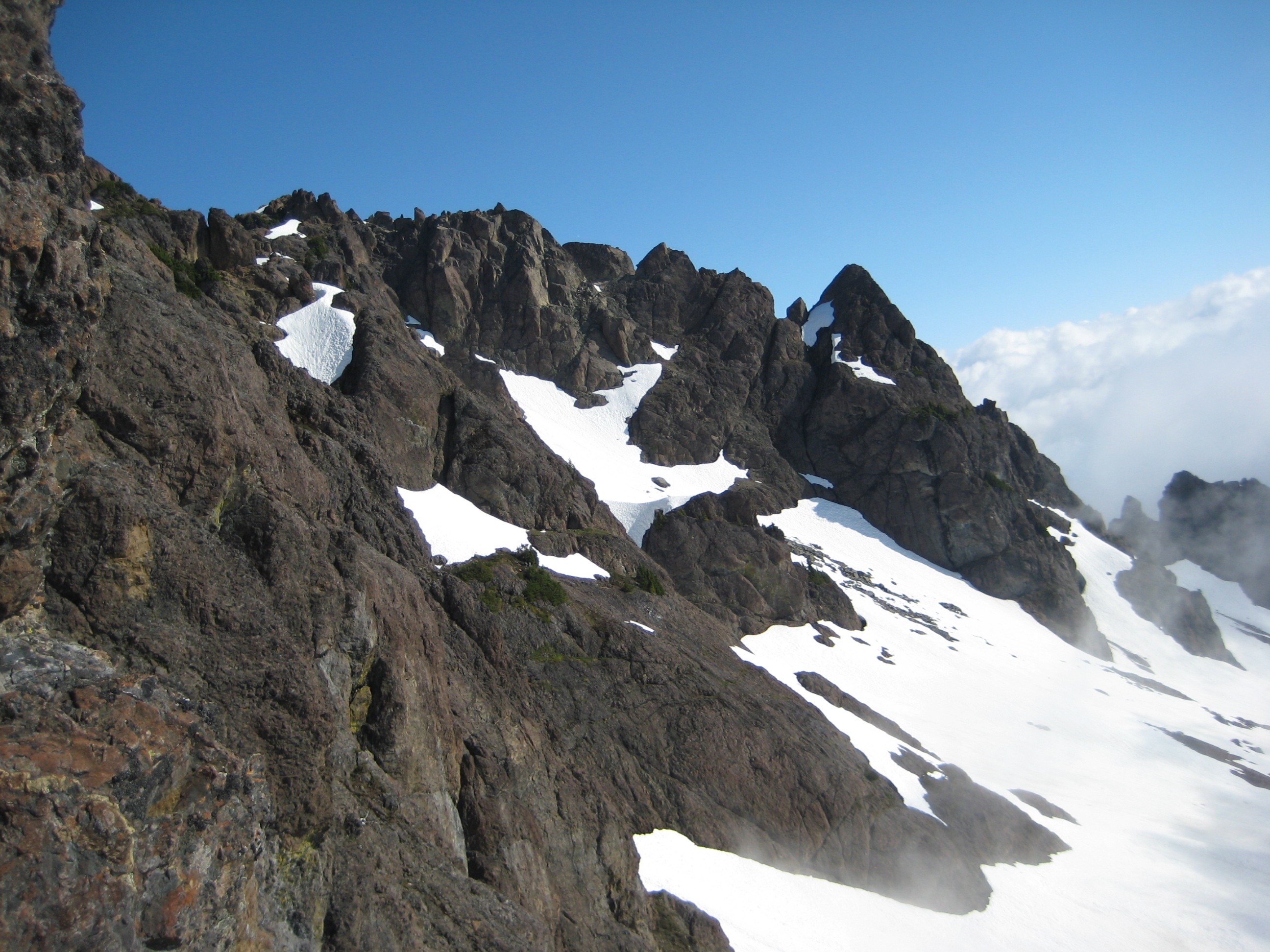 snow filled basin taken from the SE Ridge heading toward the summit of North Brother