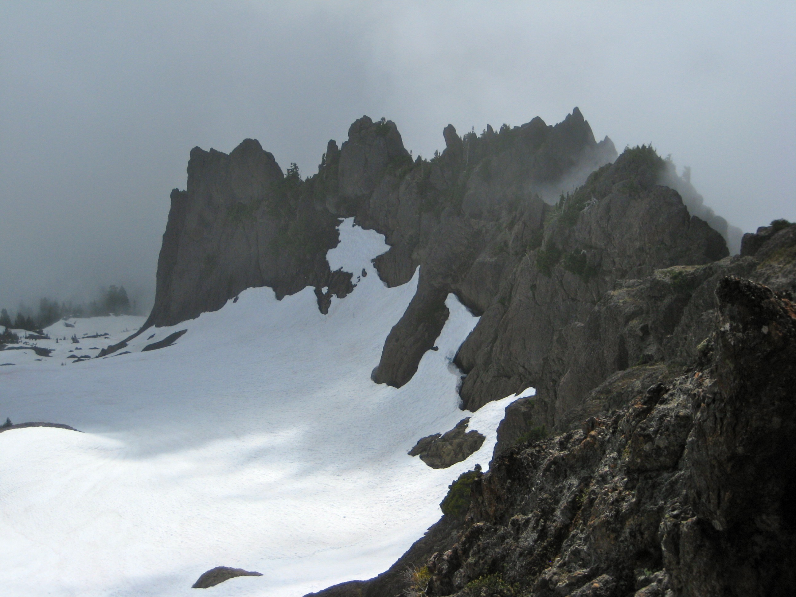 looking down SE ridge of North Brother with snow patches