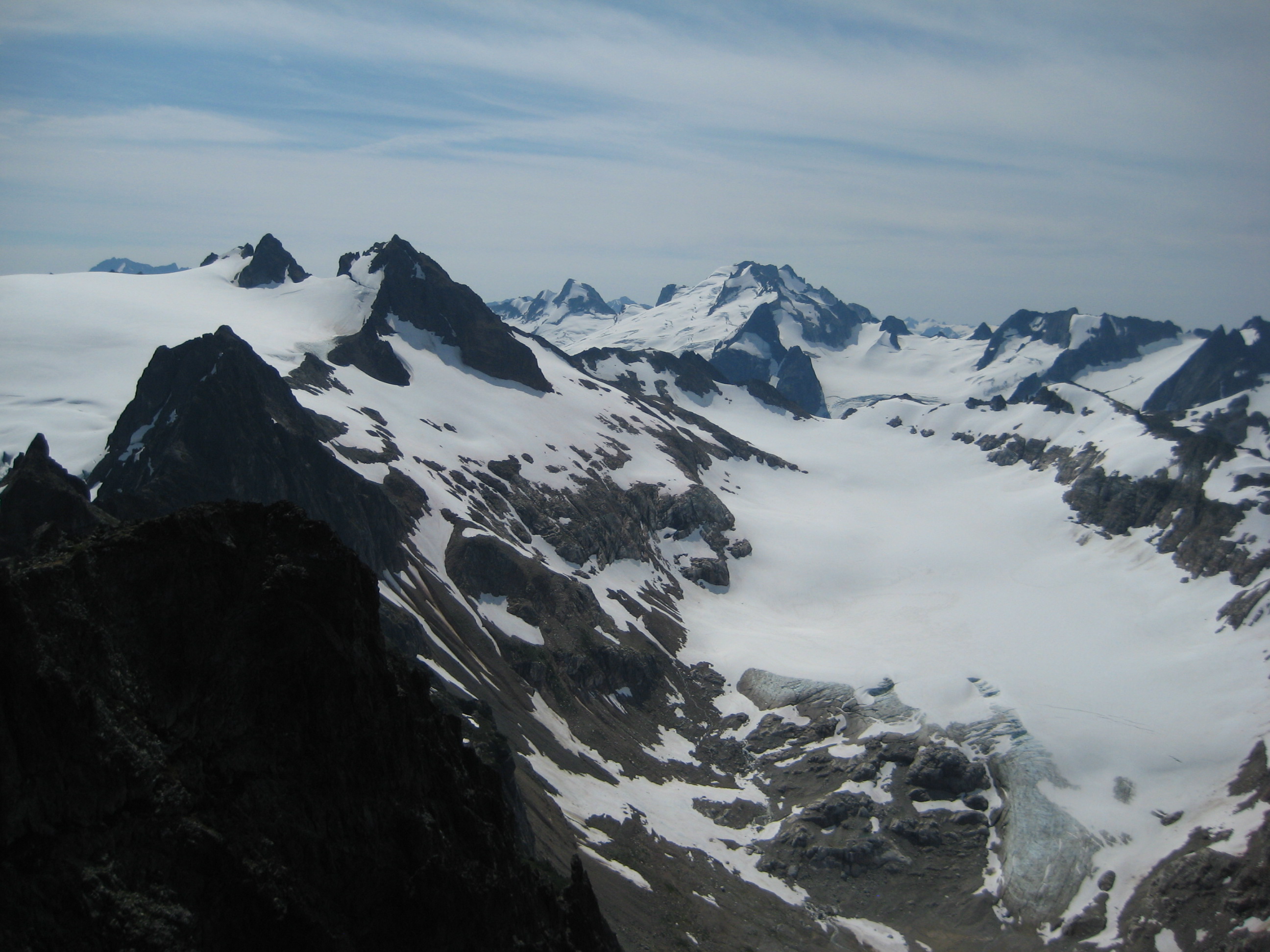 Old Guard Peak, Sentinel Peak, and Dome Peak as seen from the summit of LeConte Mountain along the Ptarmigan Traverse