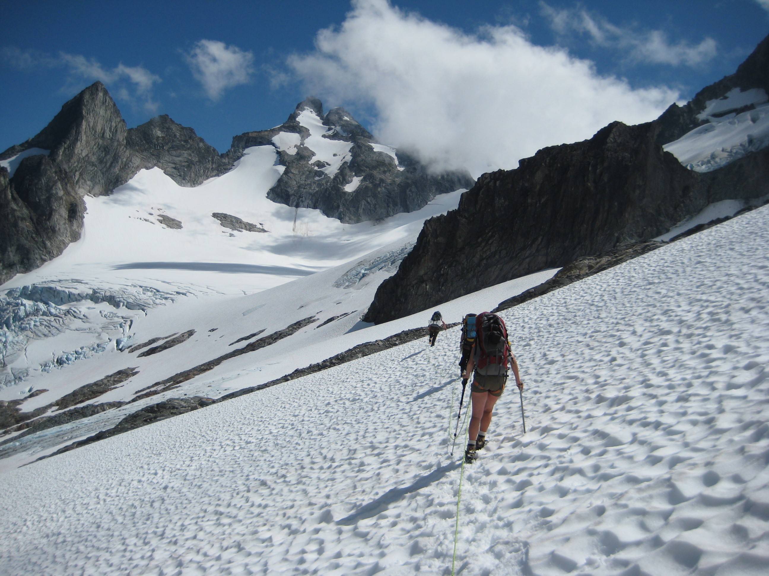 roped mountain climbers traversing to the Dana Glacier on the Ptarmigan Traverse