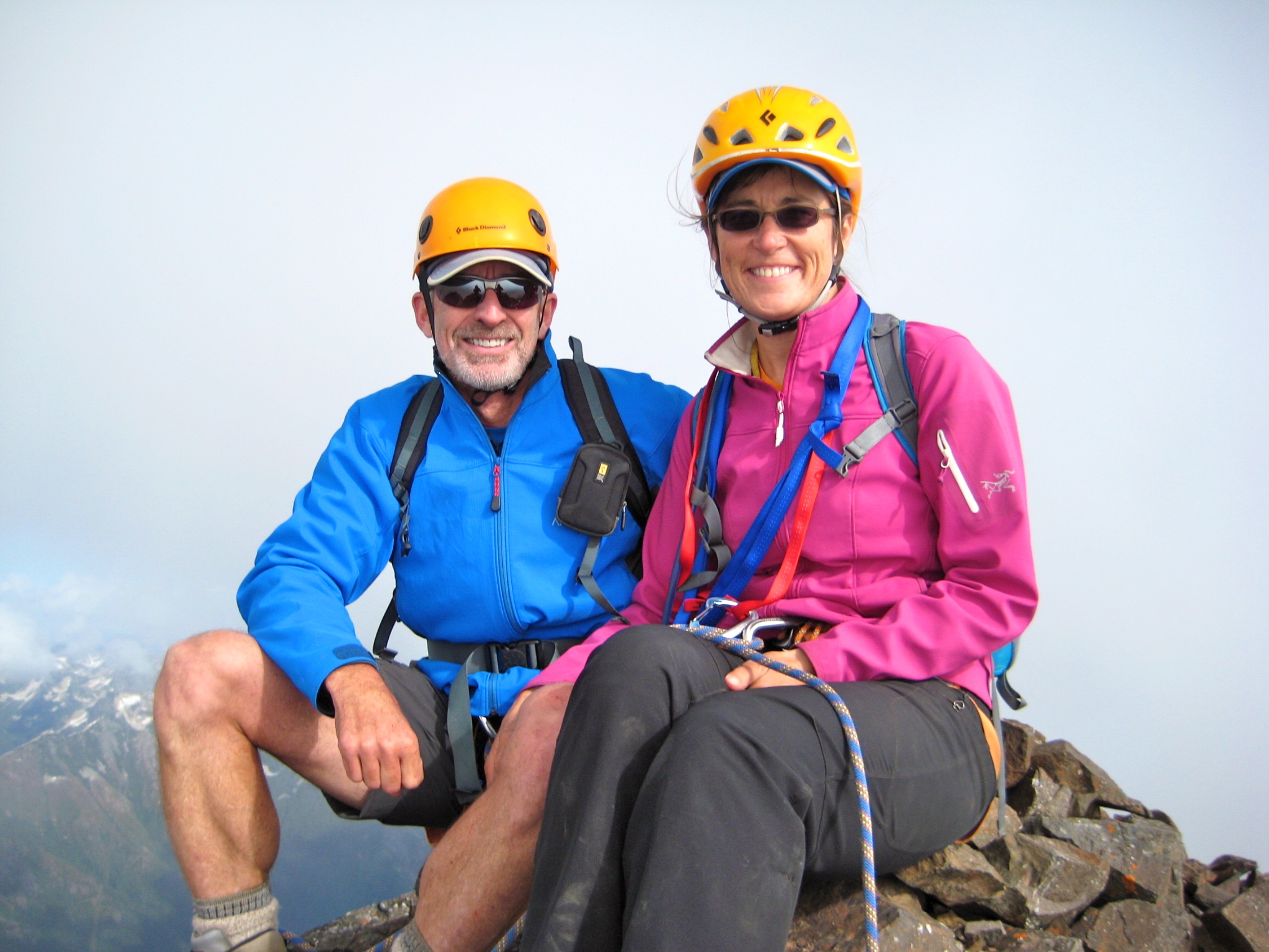 mountain climbers on the rocky summit of American Border Peak in the Mt Baker Wilderness 
