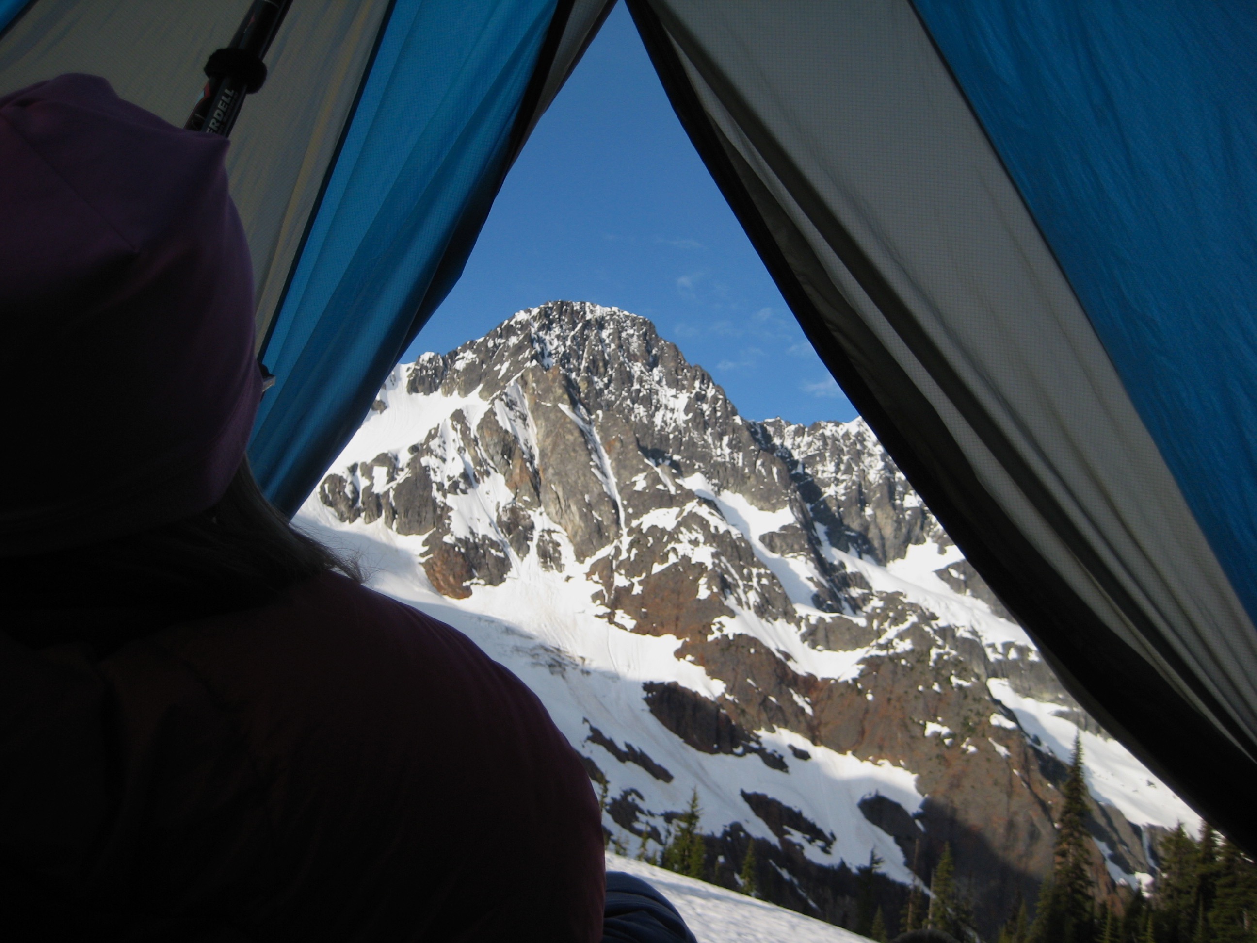 evening light on Mesahchie Peak on the Ragged Ridge from inside mountain climber's tent 