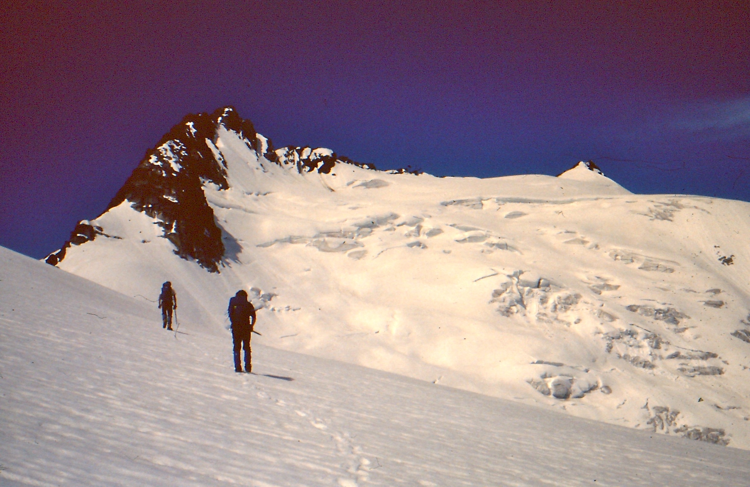 mountain climbers heading up Walrus Glacier on Clark Mountain in the Glacier Peak WIlderness In June 1979