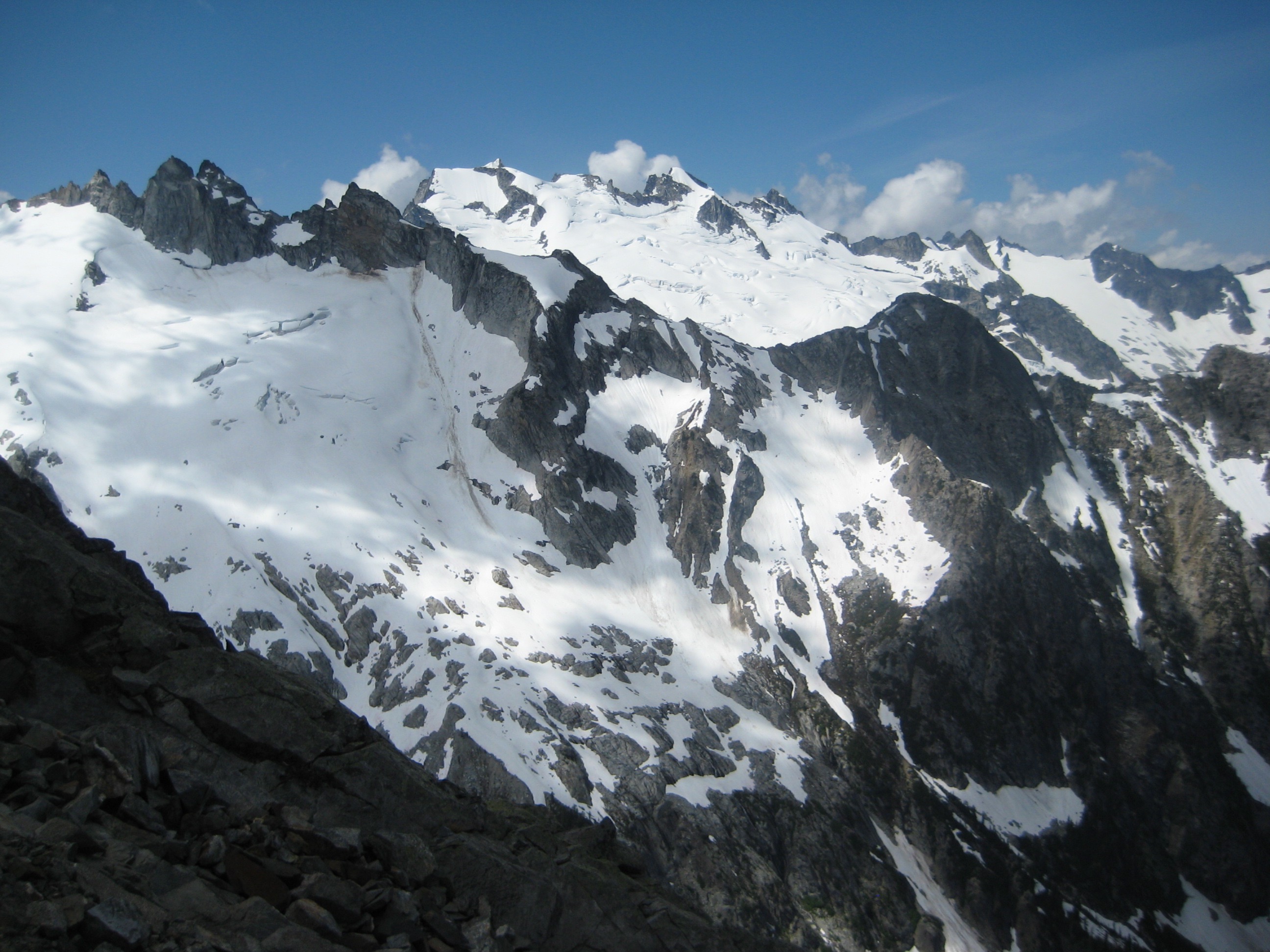 Gunsight Peak in the foreground and Dome Peak in the background as seen from Agnes Mountain in the Glacier Peak Wilderness