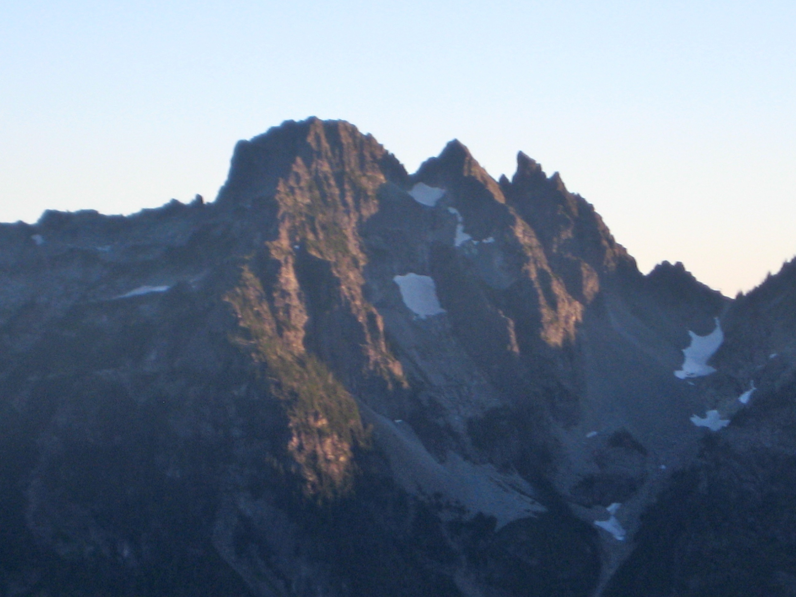 evening sun on Three Queens Mountain as senn from Vista Lake in the Alpine Lakes Wilderness