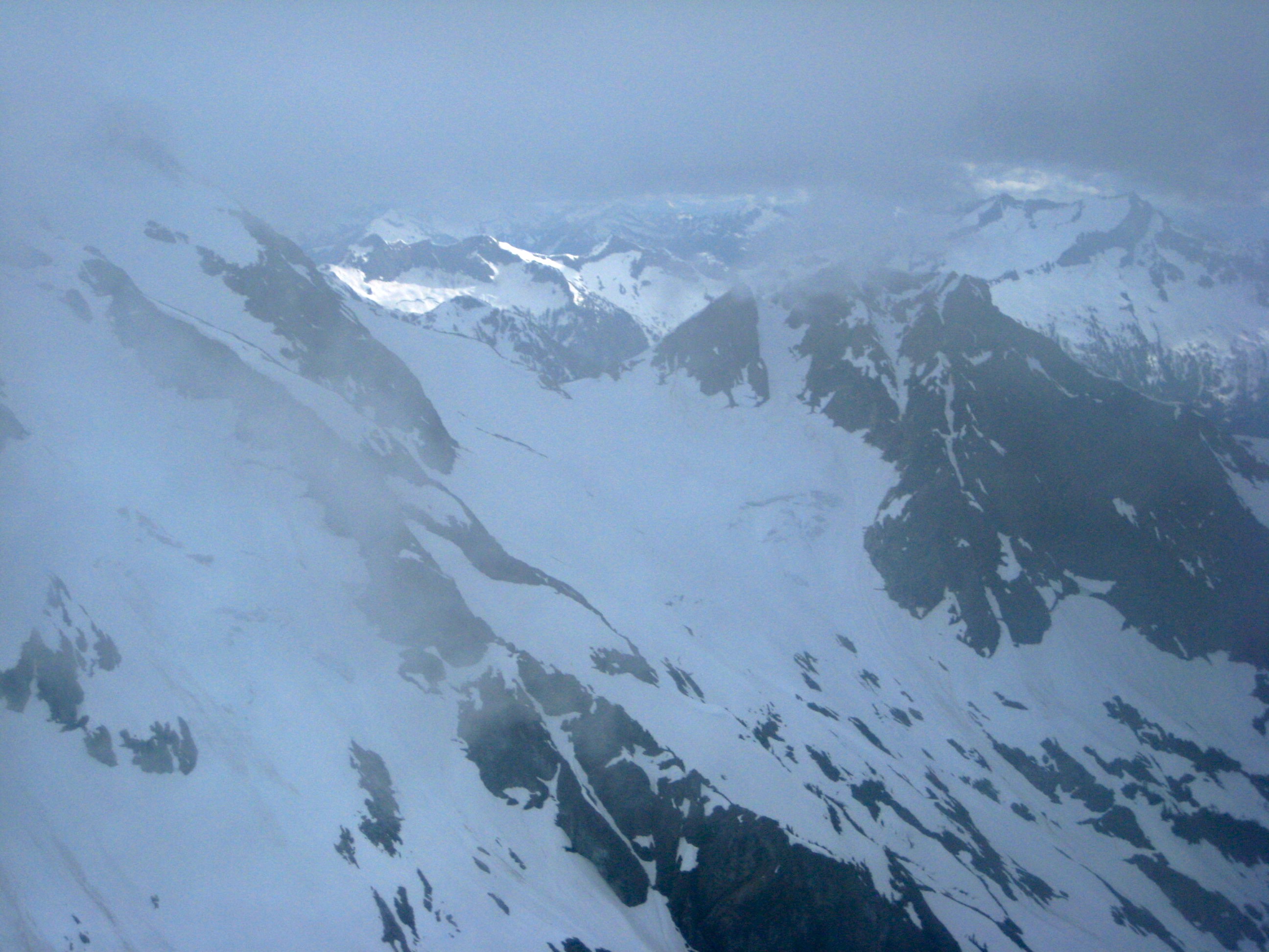 Fog partially blocking the McAllister Mountains
