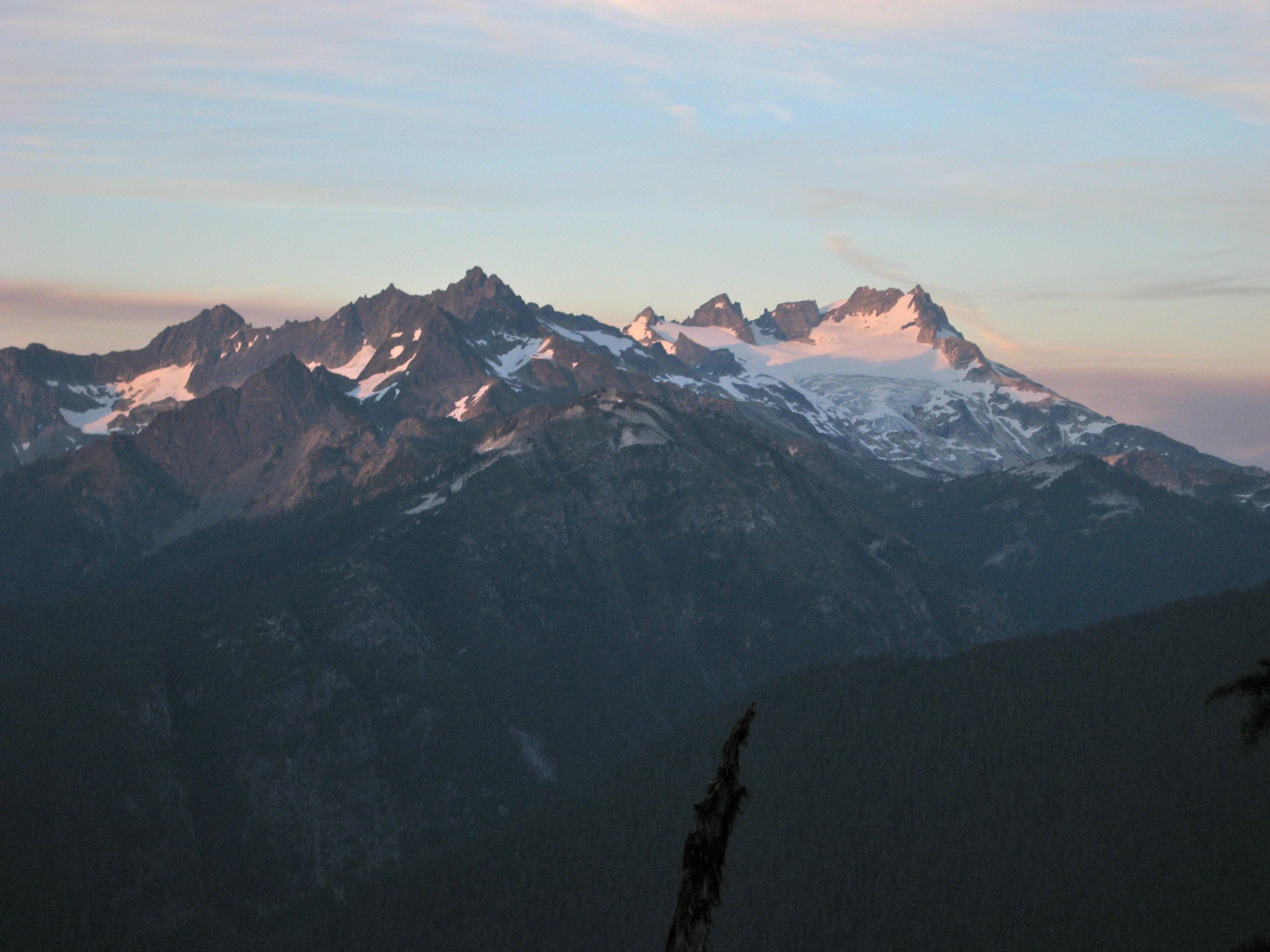 evening sun on Spire Point and Dome Peak as seen from Horse Lake Saddle in the Glacier Peak Wilderness