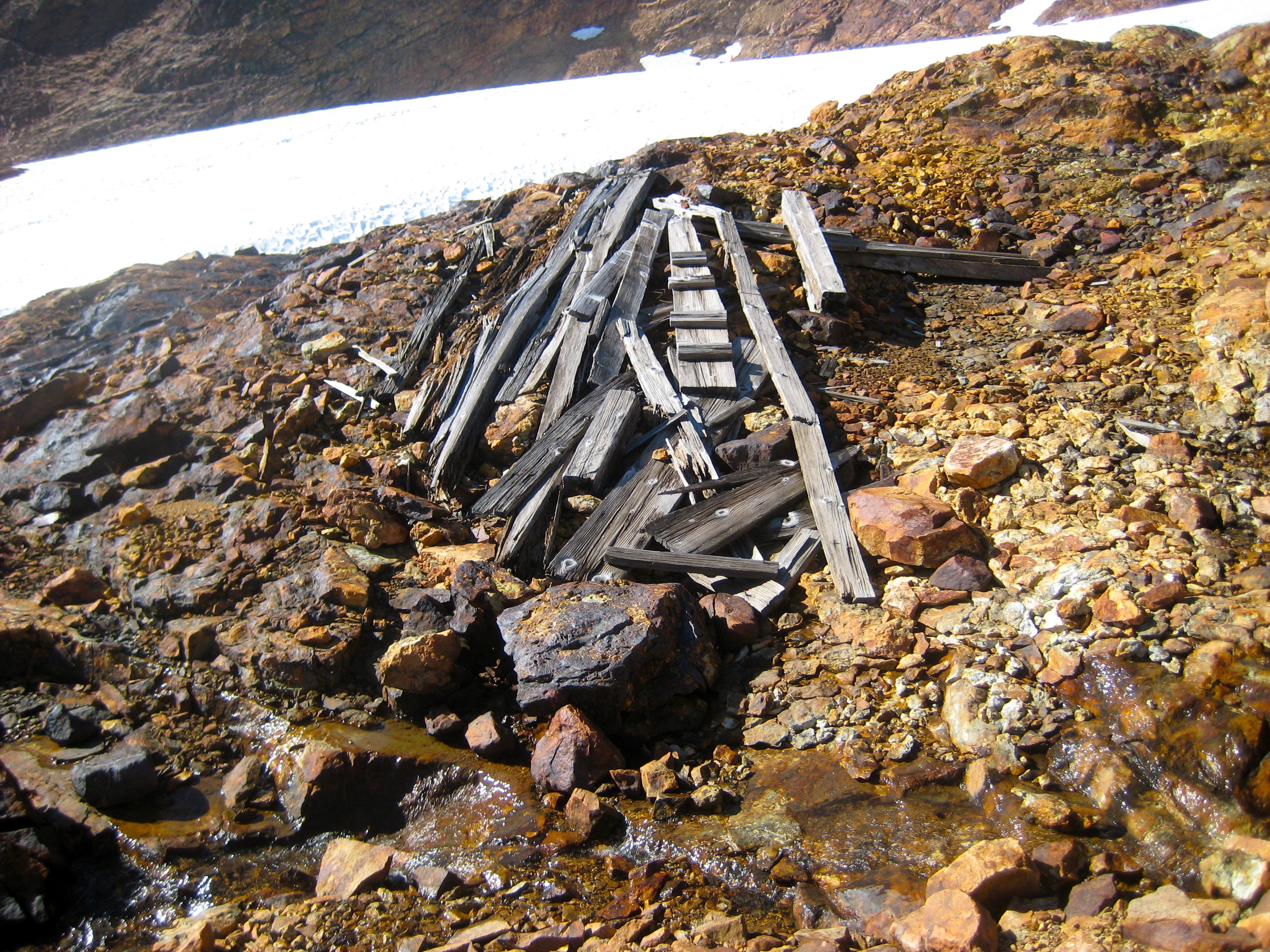 wood ruins on the rock slabs below Mt Buckindy in the Glacier Peak Wilderness