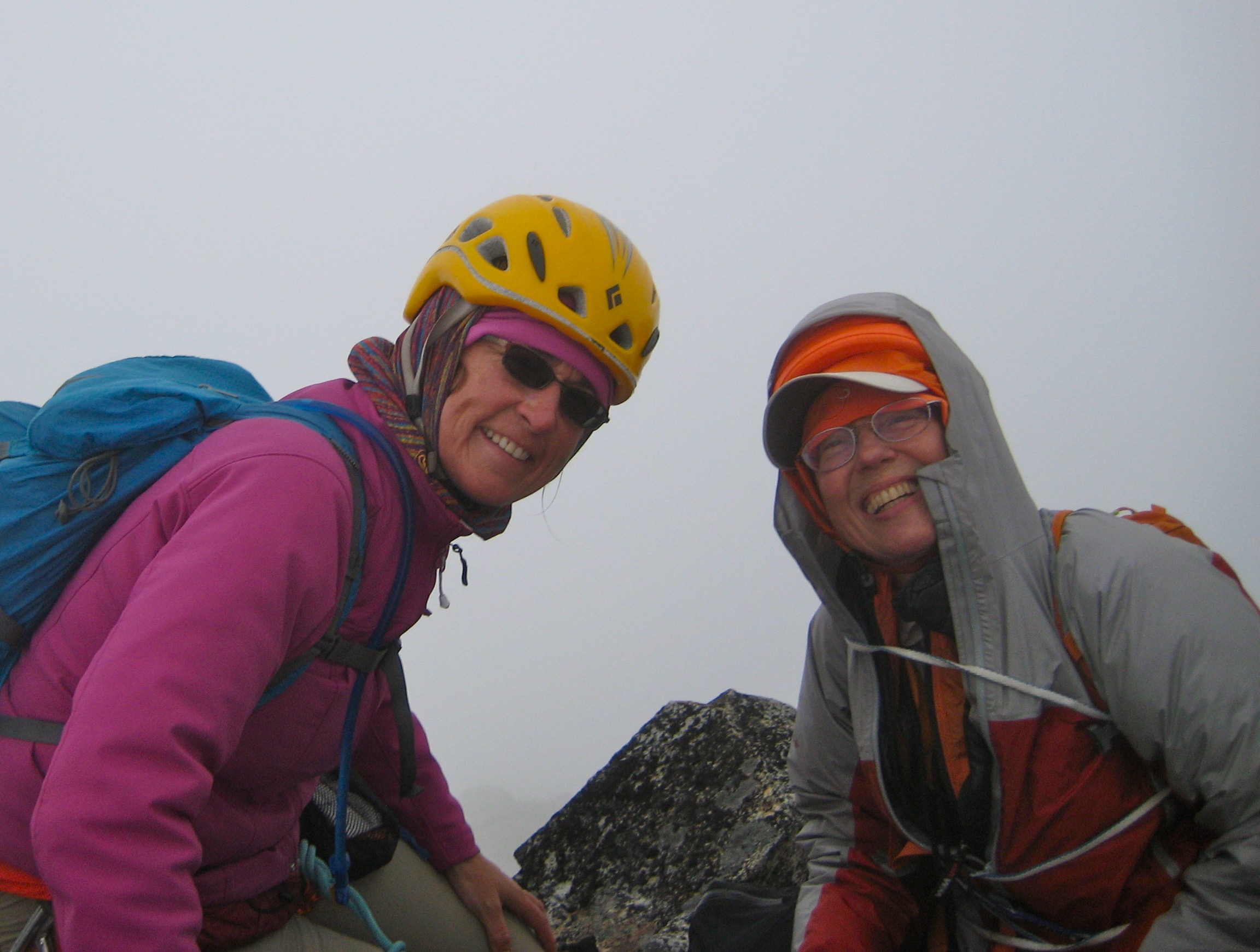 climbers in the fog on the summit of Challenger Pinnacle