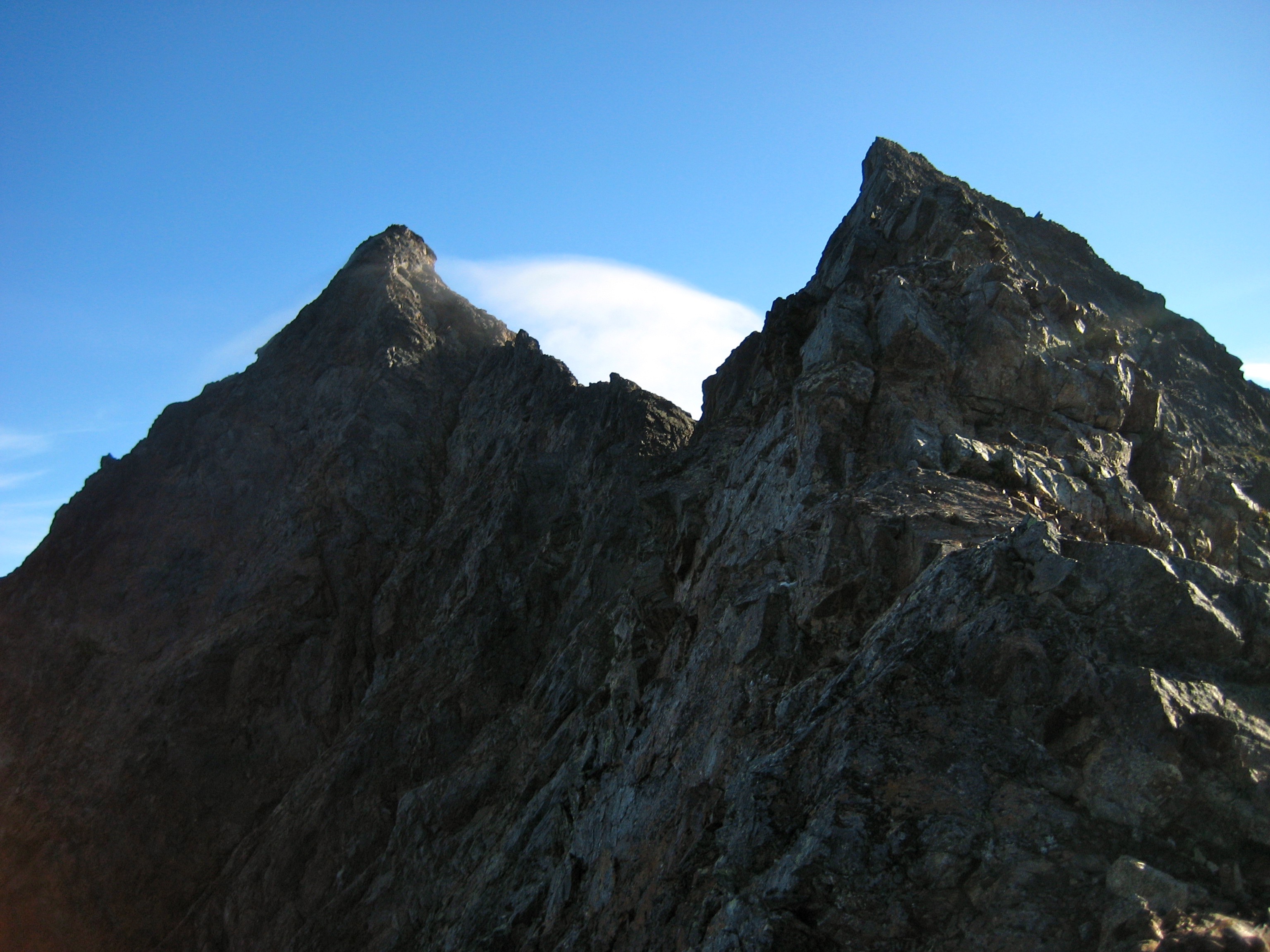rock summit horn of Welch Peak in the Cheam Range with false summit horn in the foreground